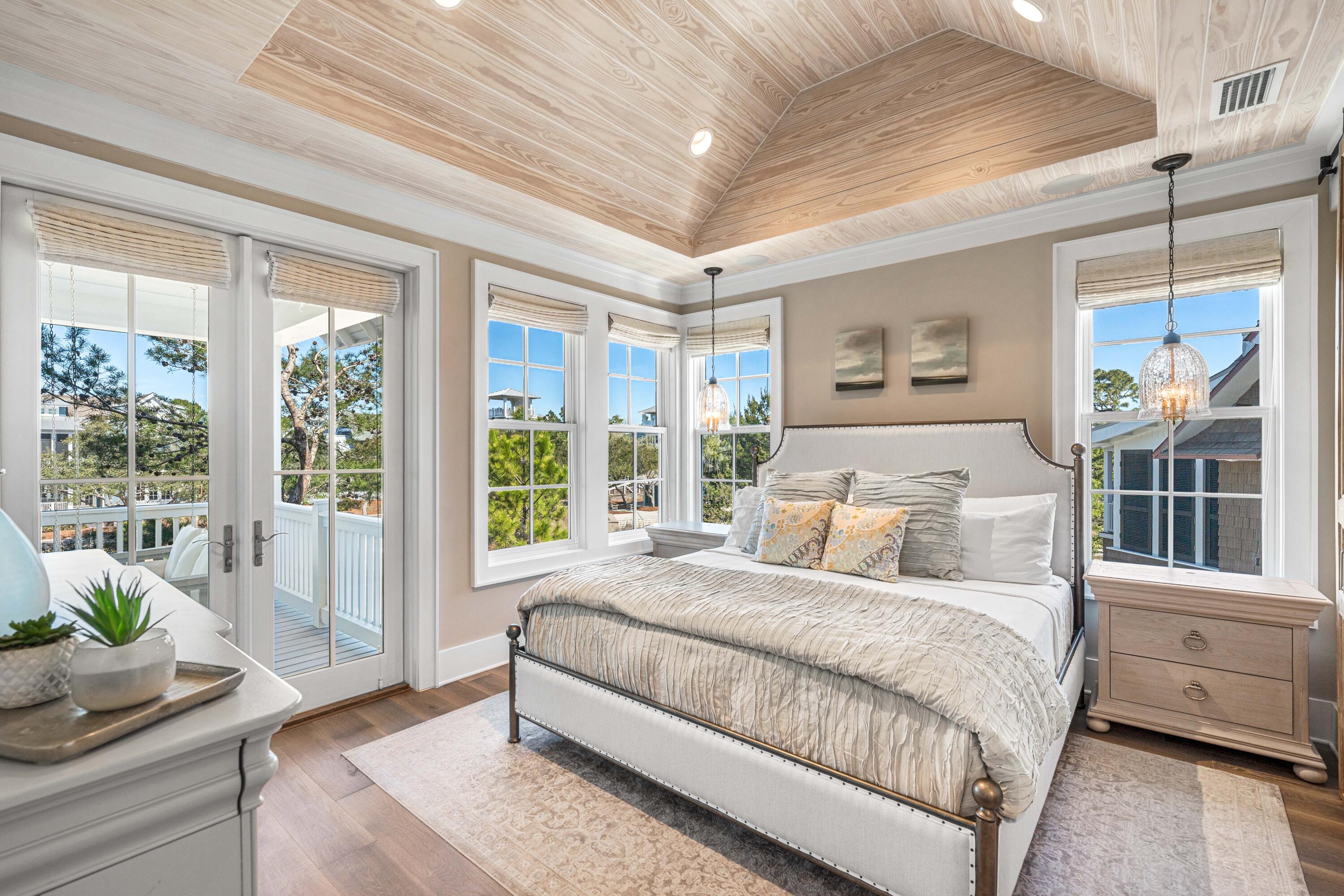 41 Compass Point Way Watersound, FL 32461 - Photo 43 of 75 a bedroom with a bed and a window