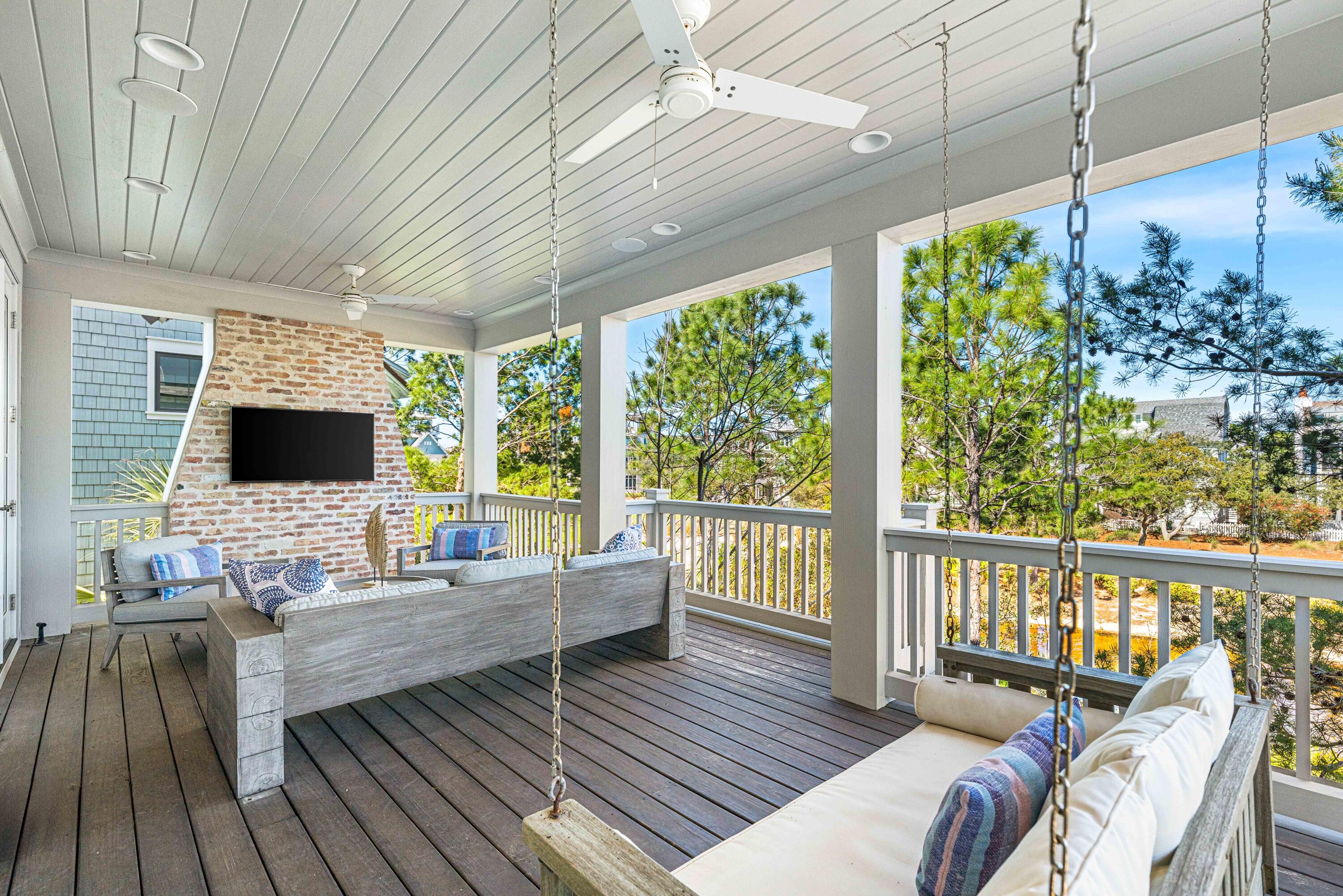 41 Compass Point Way Watersound, FL 32461 - Photo 46 of 66 a living room with furniture fireplace and a flat screen tv