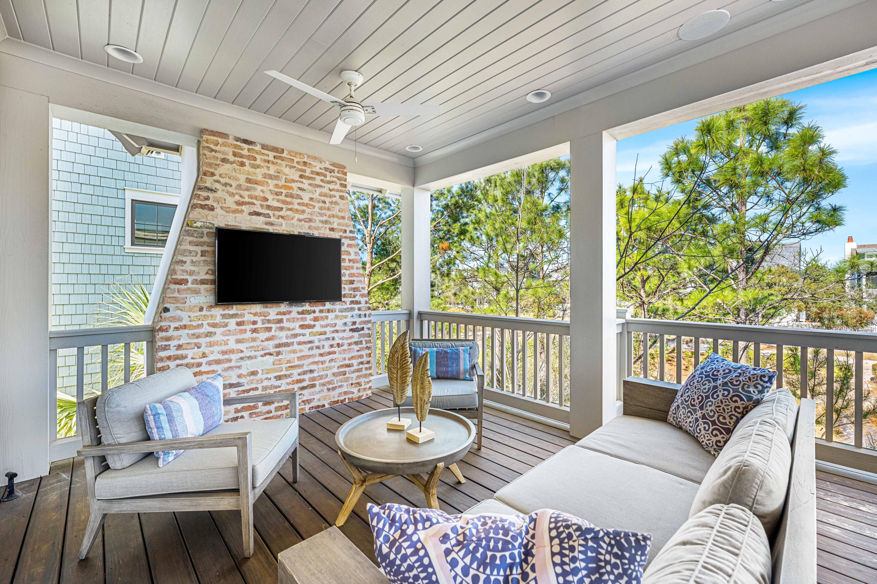 41 Compass Point Way Watersound, FL 32461 - Photo 47 of 75 a outdoor living space with furniture and a flat screen tv