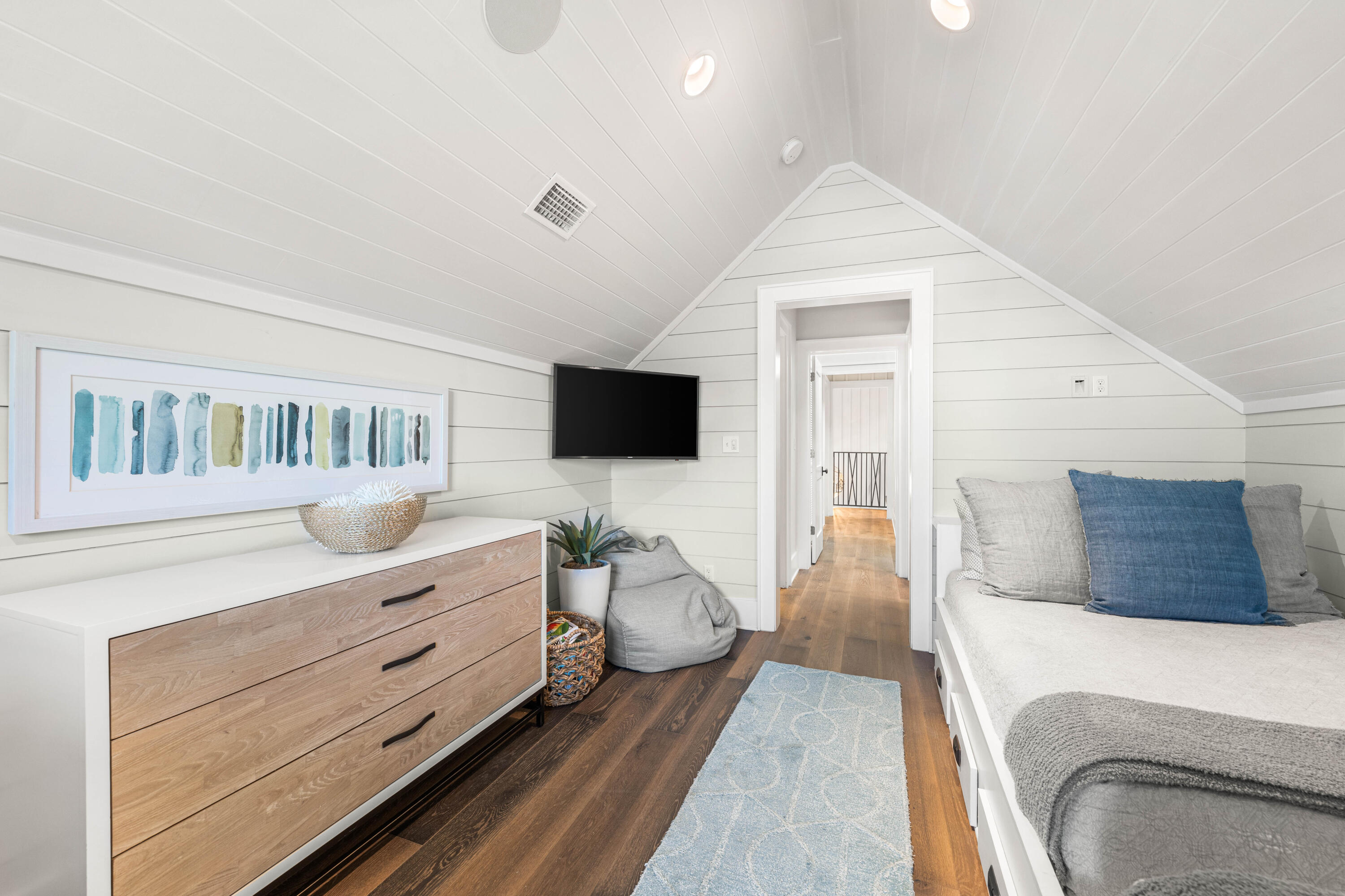 41 Compass Point Way Watersound, FL 32461 - Photo 53 of 75 a bedroom with furniture and flat screen tv