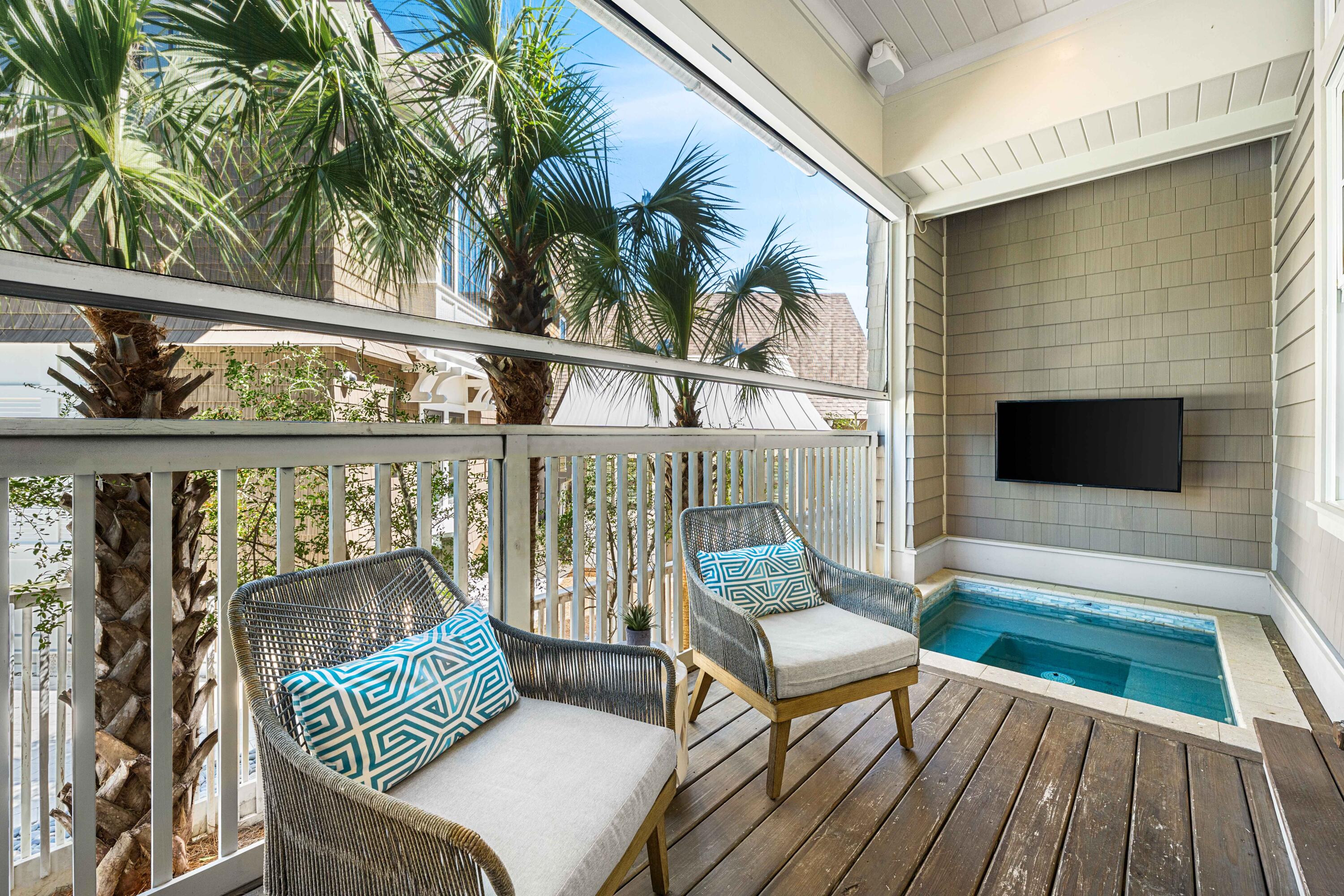 41 Compass Point Way Watersound, FL 32461 - Photo 63 of 75 a balcony with table and chairs