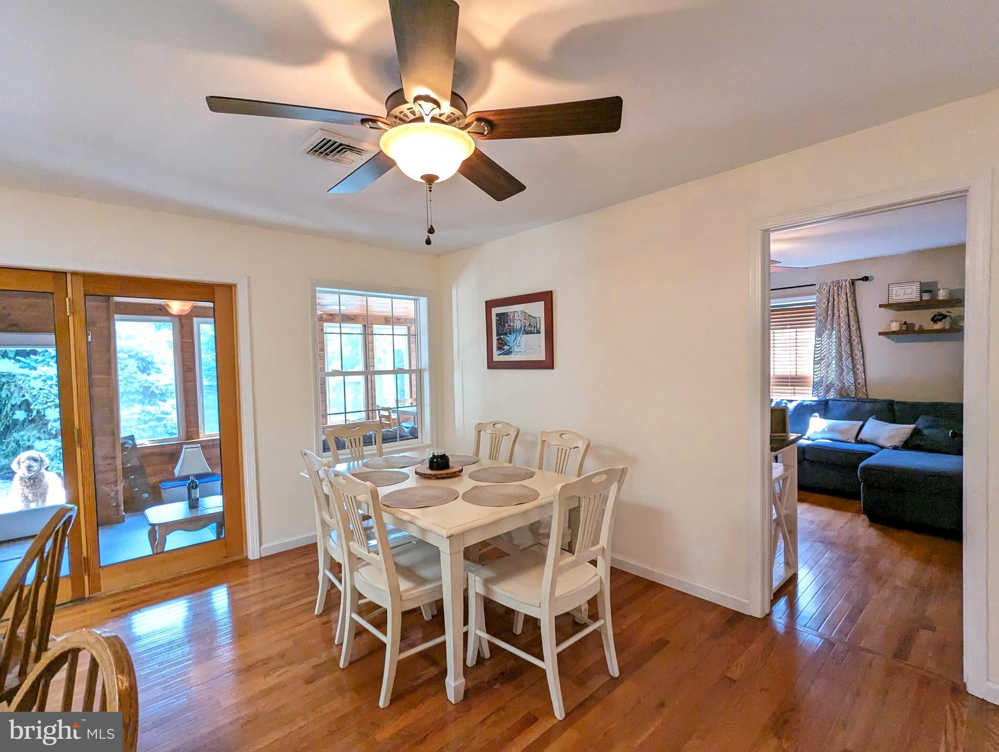 25 Maple Avenue Gettysburg, PA 17325 - Photo 21 of 35 a view of a dining room with furniture wooden floor and chandelier
