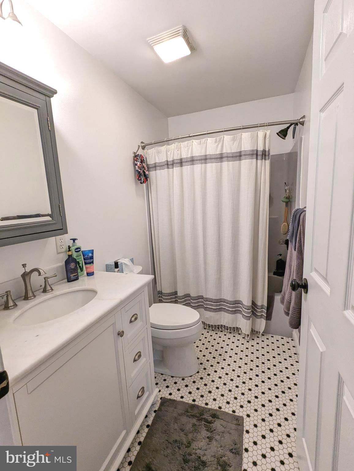 25 Maple Avenue Gettysburg, PA 17325 - Photo 25 of 35 a bathroom with a sink a toilet and shower