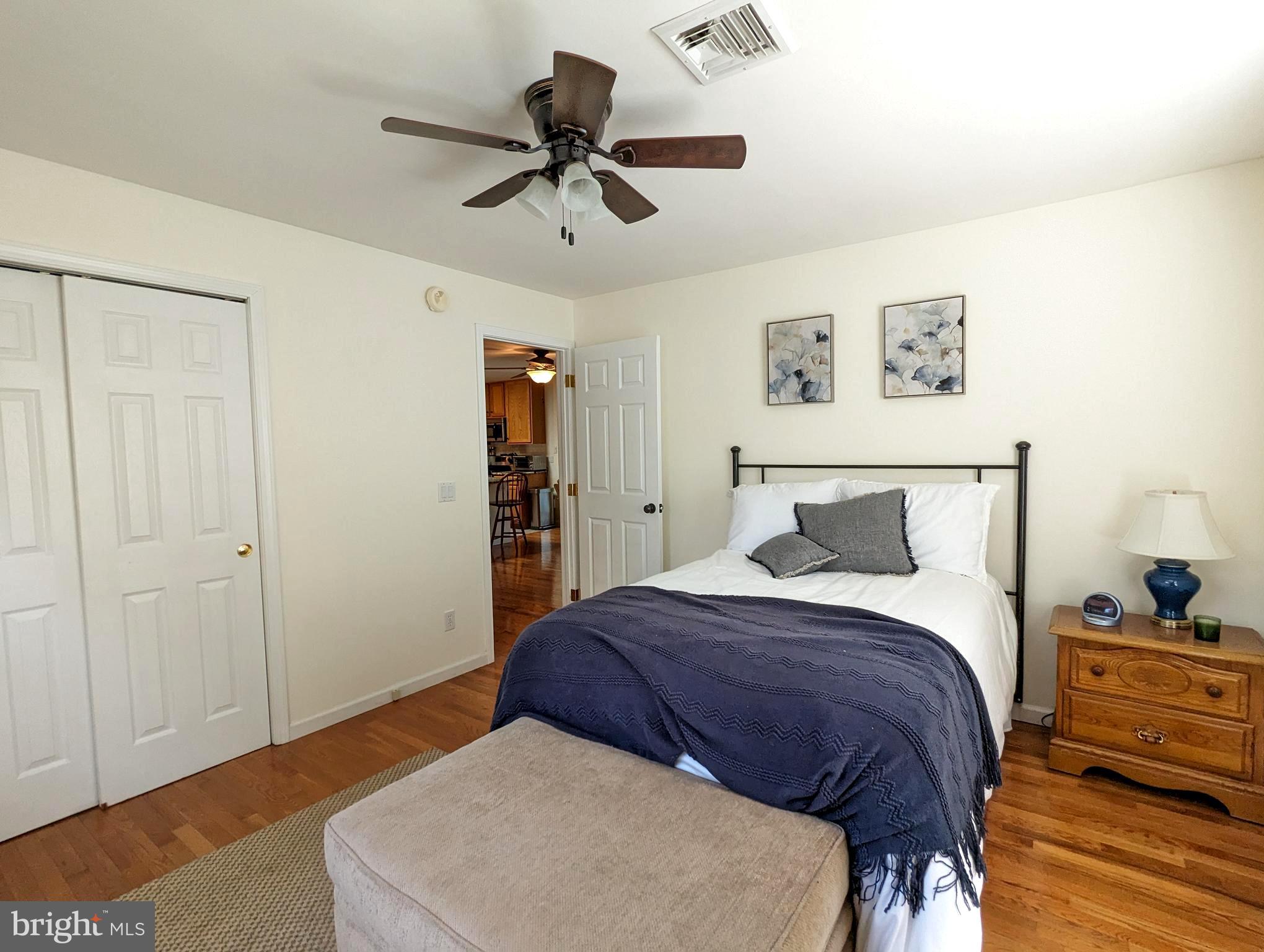 25 Maple Avenue Gettysburg, PA 17325 - Photo 27 of 35 a bedroom with a bed and a ceiling fan