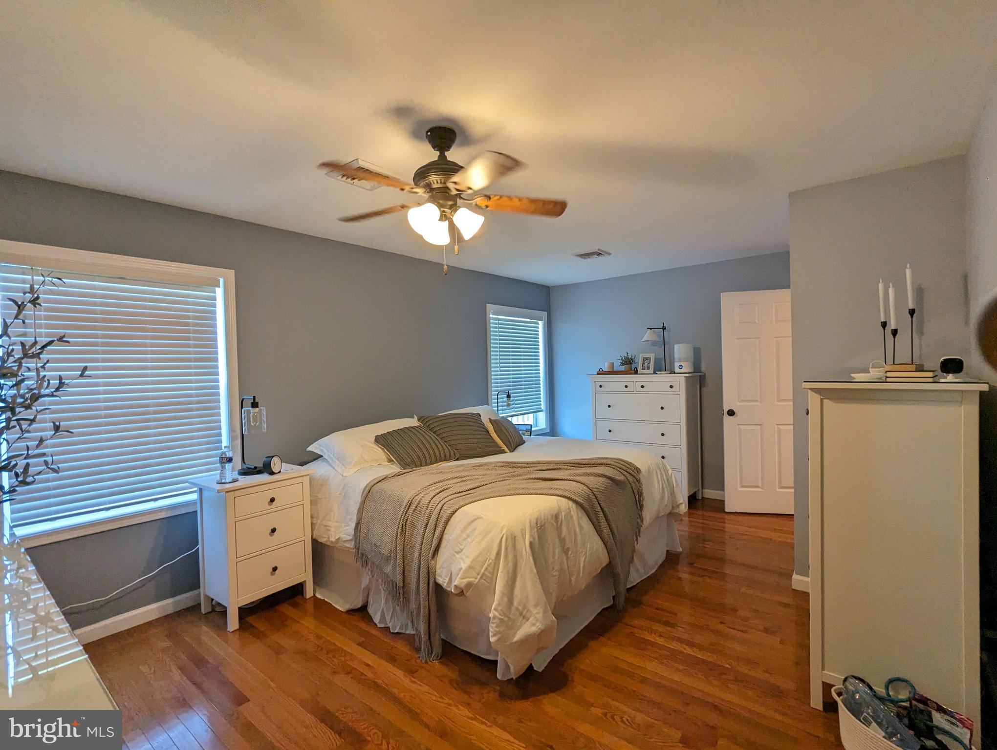 25 Maple Avenue Gettysburg, PA 17325 - Photo 32 of 35 a bedroom with bed and a chandelier
