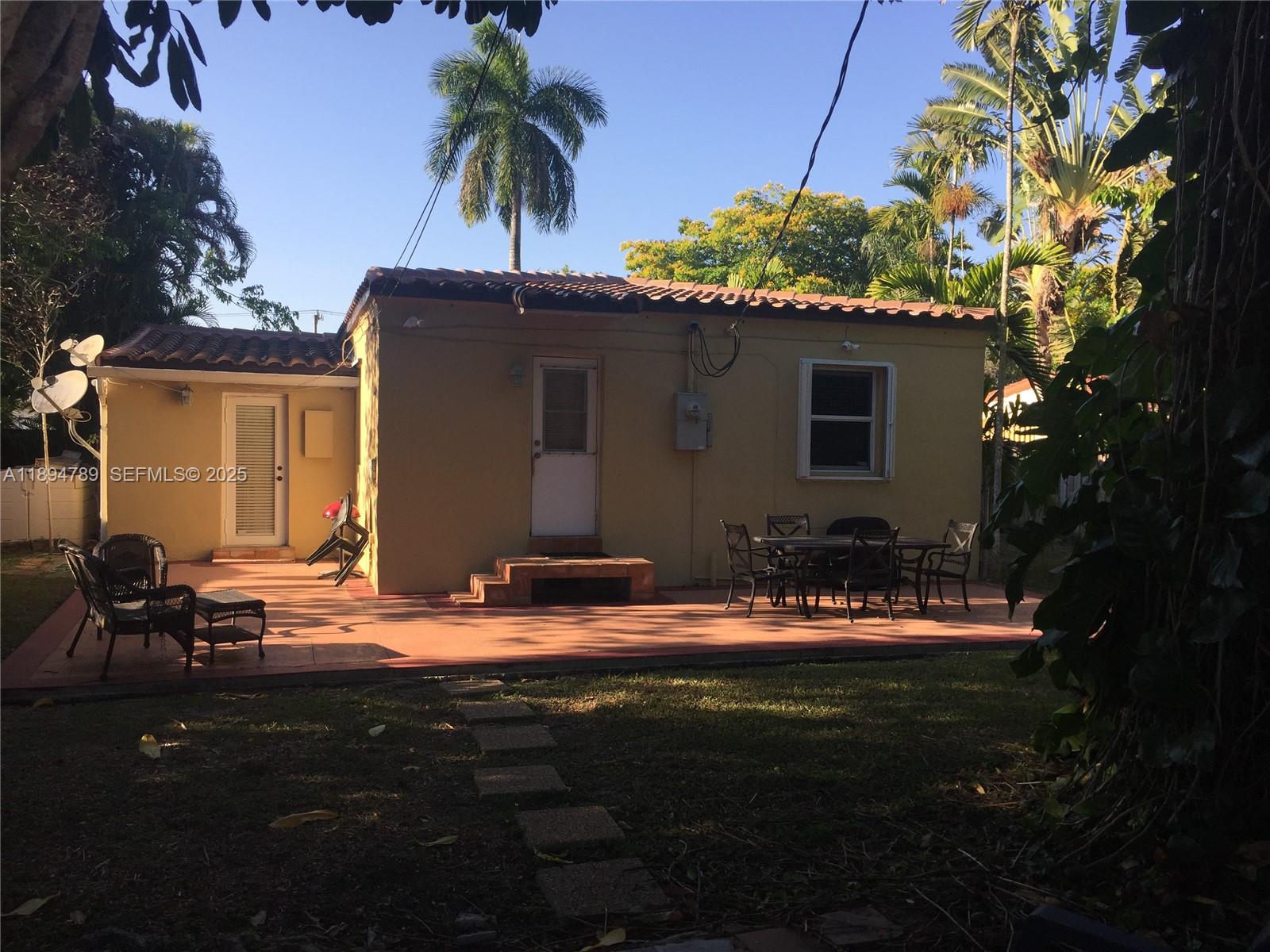 5886 Southwest 42nd Street Miami, FL 33155 - Photo 5 of 19 Large concrete patio ideal for entertaining