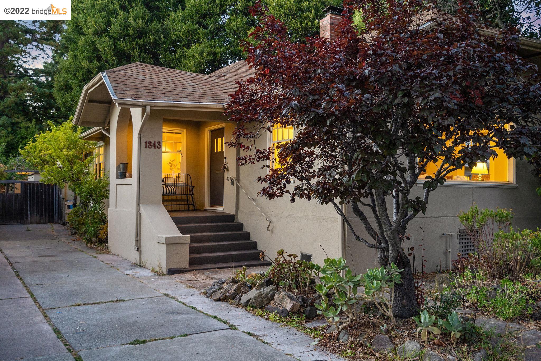 a house with trees in front of it