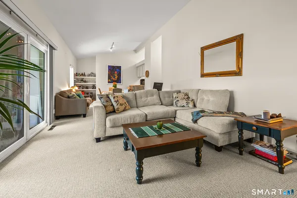 a living room with furniture and a couch