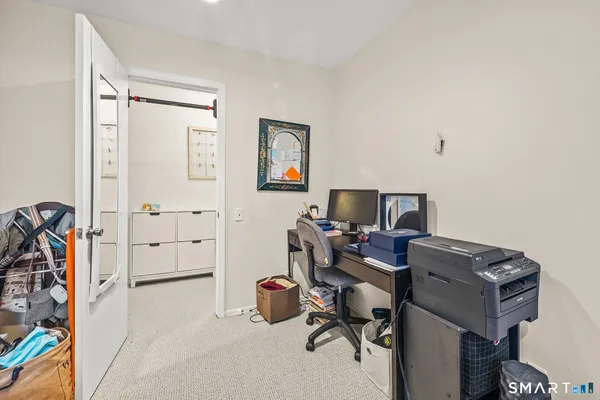 a view of a workspace with furniture