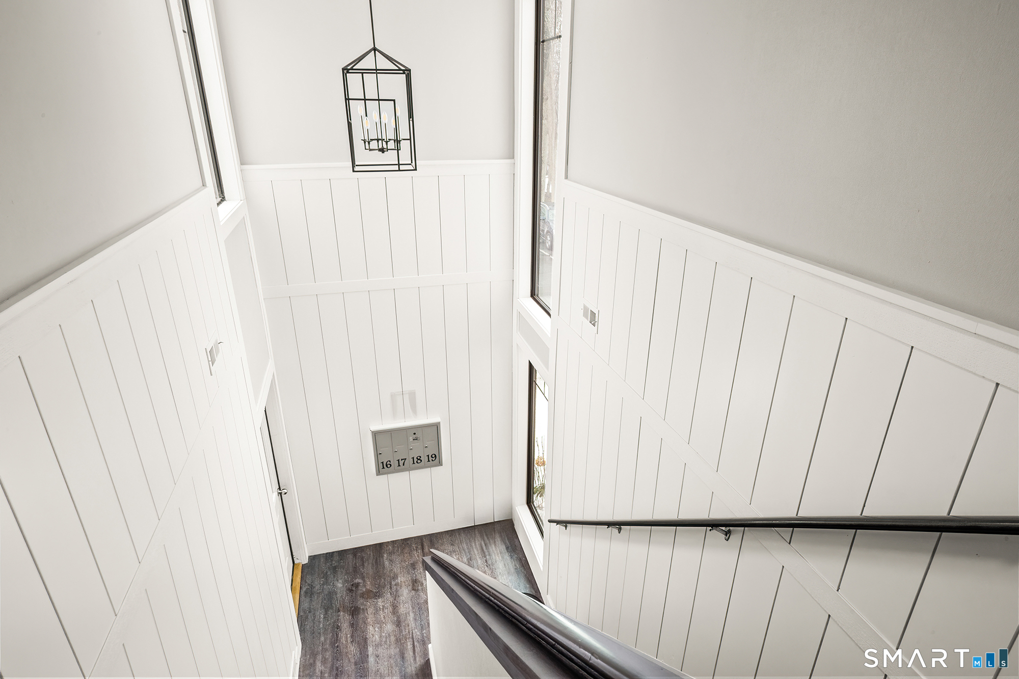 19 Cook Close, Unit 19 Ridgefield, CT 06877 - Photo 27 of 32 This unit is on the second floor, the mailboxes are located in the entry and one more level down there is a storage closet and laundry.