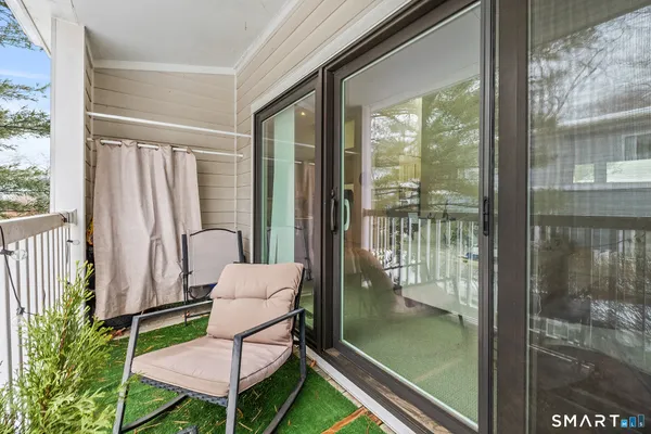 a balcony view with a couch