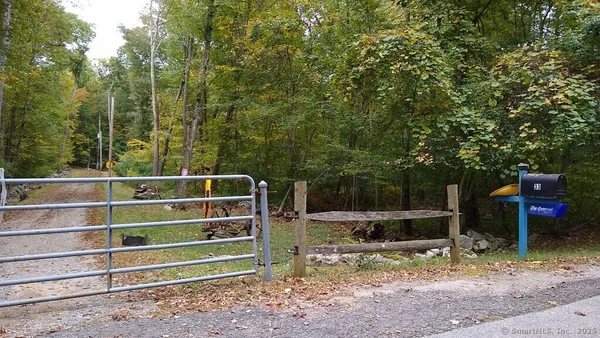 a view of a wooden fence