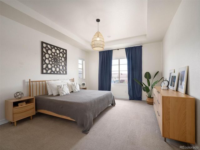 a bedroom with a bed furniture and a window