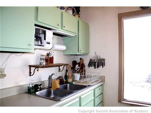 37 Rasor Court Keystone, CO 80435 - Photo 5 of 17 a kitchen with a sink and cabinets