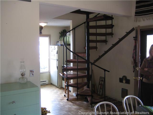 37 Rasor Court Keystone, CO 80435 - Photo 6 of 17 a view of entryway with wooden floor and stairs