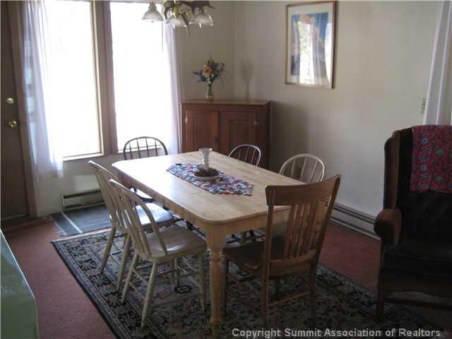 37 Rasor Court Keystone, CO 80435 - Photo 7 of 17 a view of a dining room with furniture and window