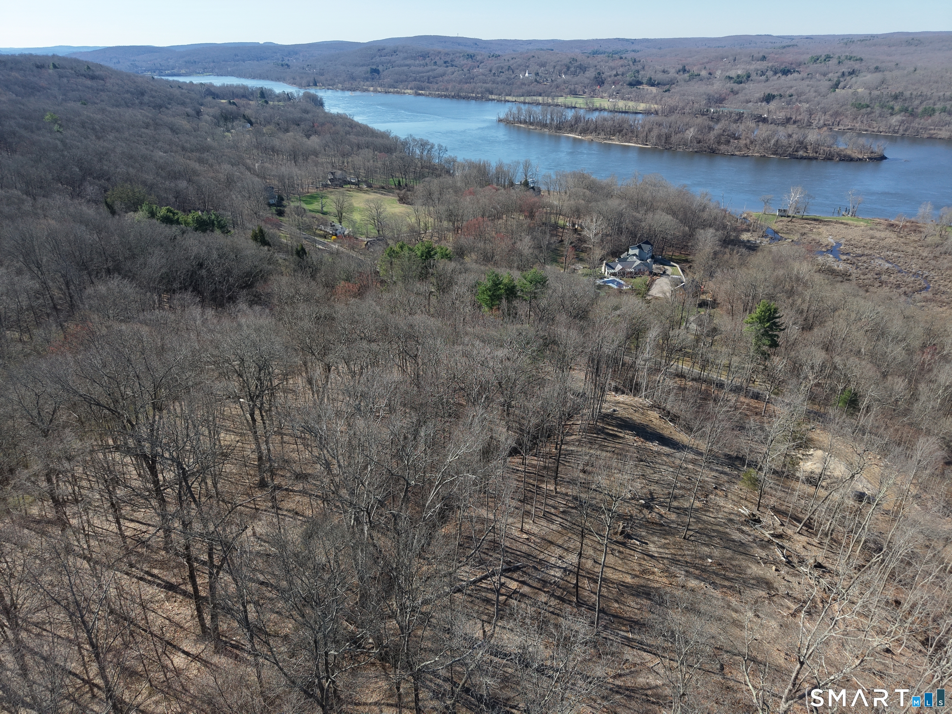 94 Injun Hollow Road Haddam, CT 06424 - Photo 2 of 17 a view of a lake with mountain