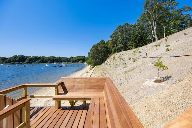 a view of backyard with outdoor seating