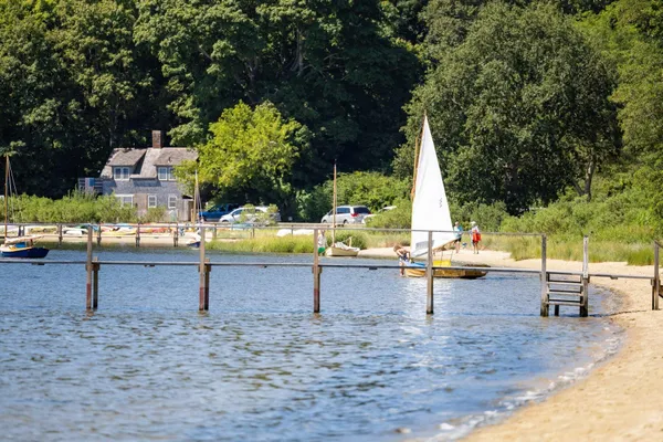a view of a lake with a sitting area
