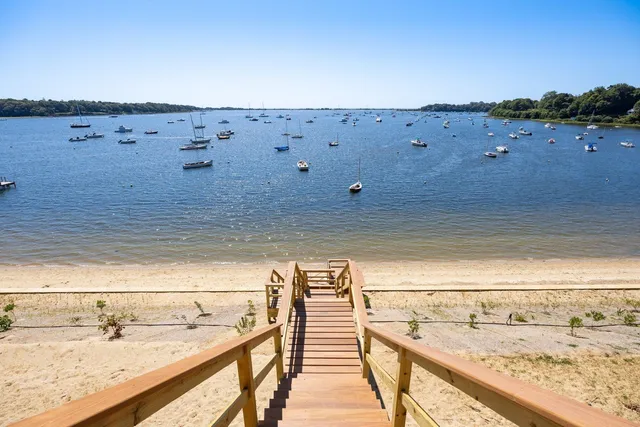 a view of swimming pool with a lounge chair