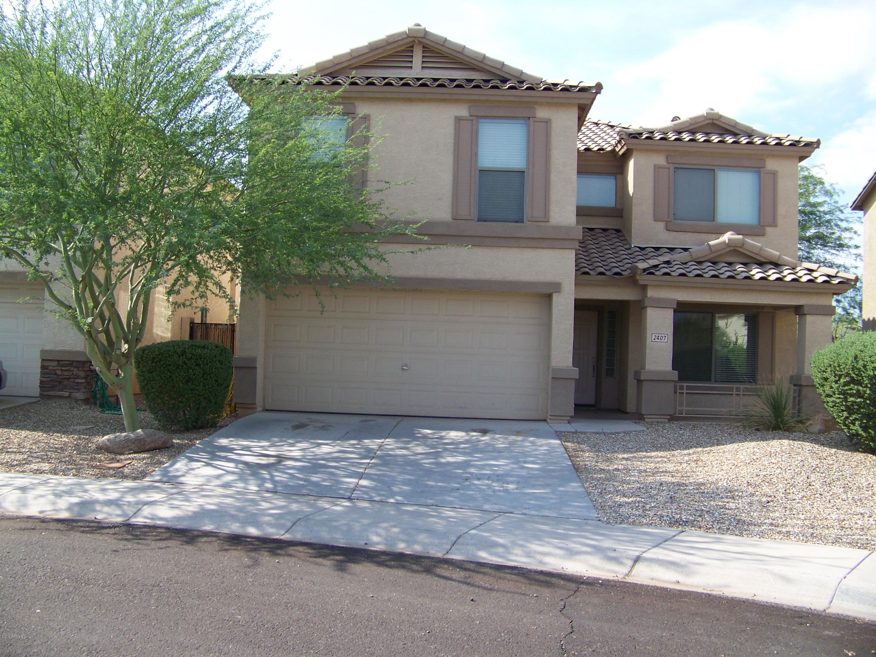 2407 West Via Dona Road Phoenix, AZ 85085 - Photo 1 of 8 FRONT