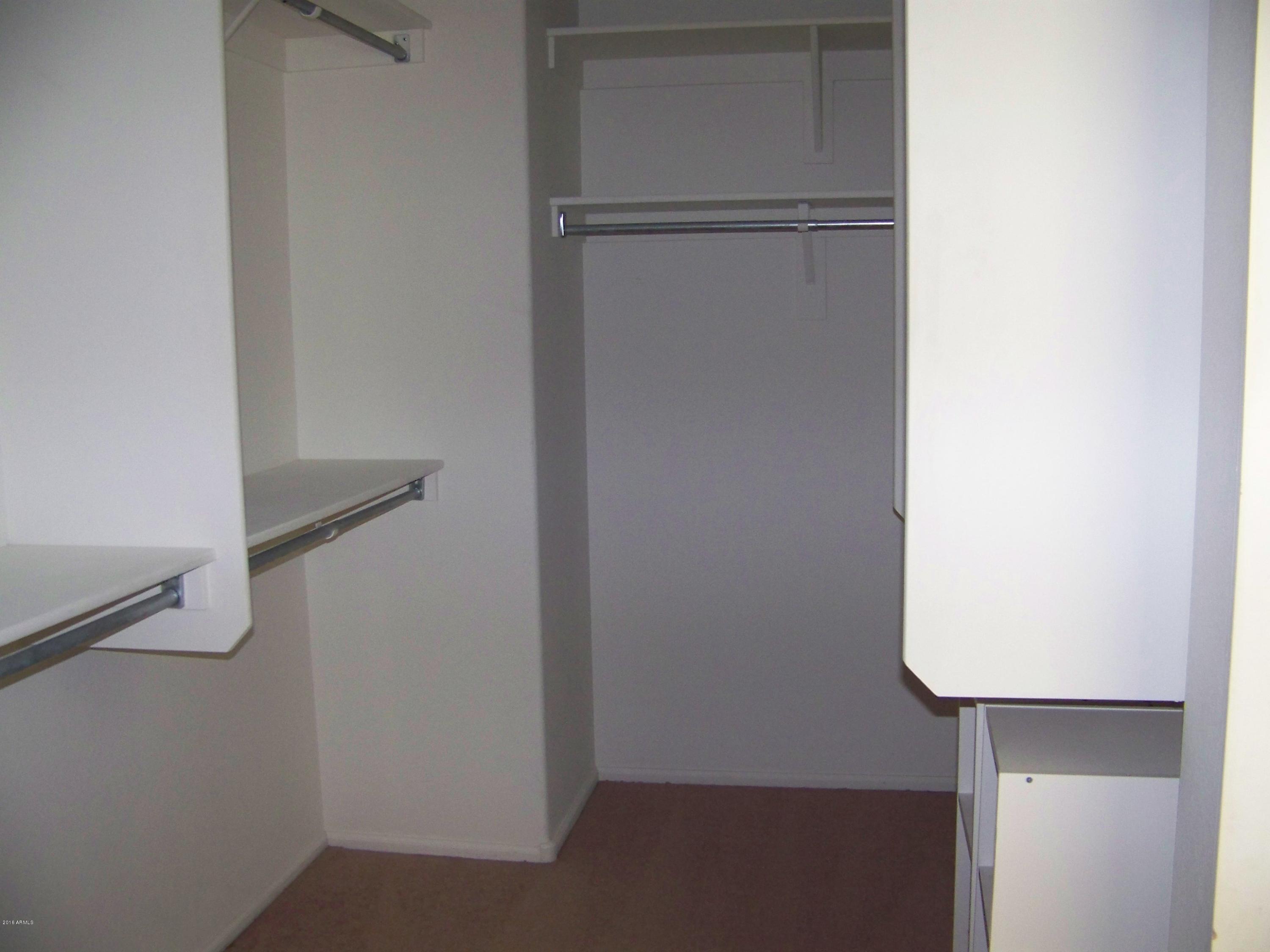 2407 West Via Dona Road Phoenix, AZ 85085 - Photo 6 of 8 LAWRENCE-RENTAL-MASTER CLOSET