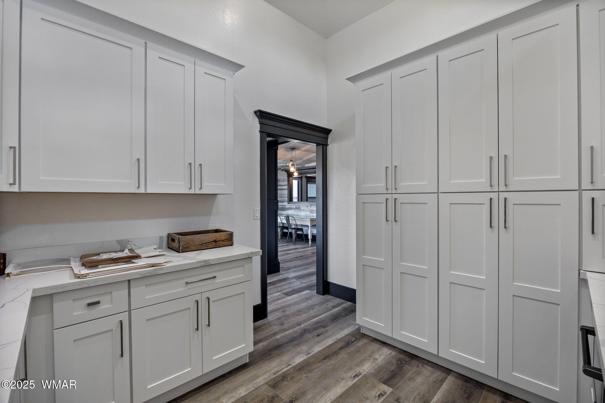 7106 Long Road Show Low, AZ 85901 - Photo 15 of 65 a kitchen with white cabinets and white appliances