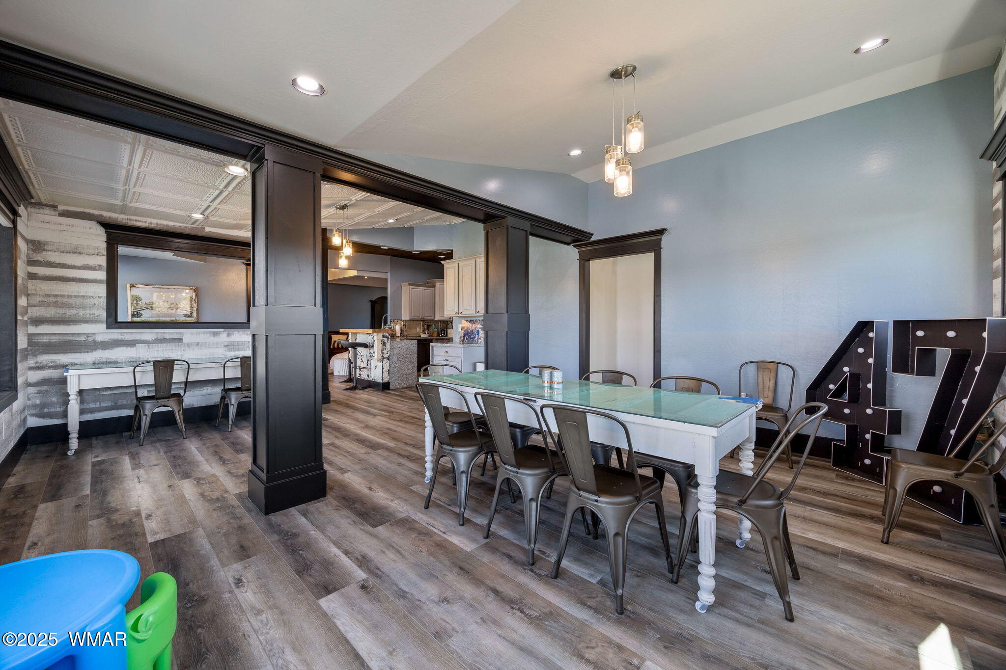 7106 Long Road Show Low, AZ 85901 - Photo 17 of 65 a view of a dining room with furniture window and wooden floor