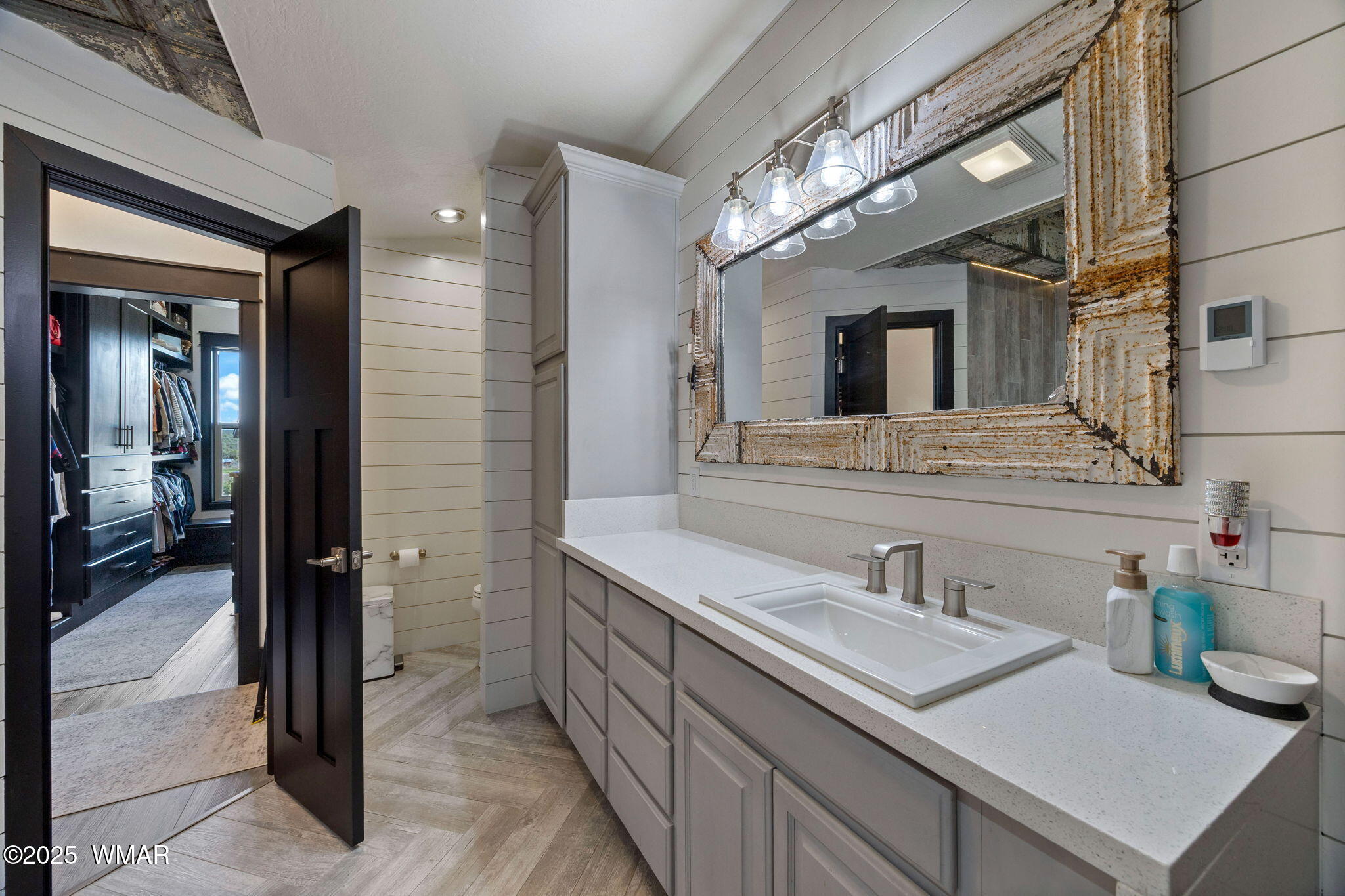 7106 Long Road Show Low, AZ 85901 - Photo 20 of 65 a bathroom with a sink double vanity and a mirror