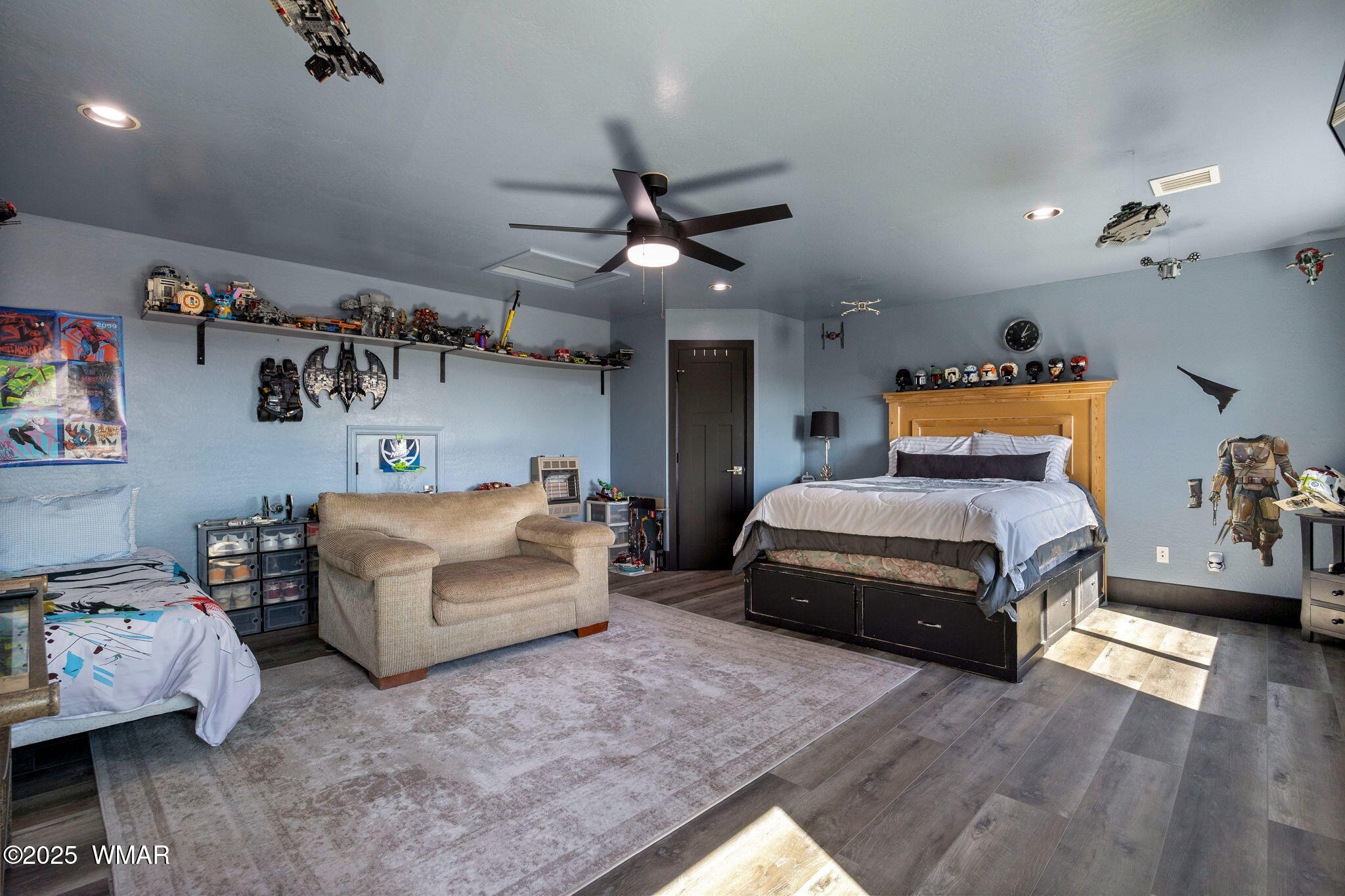 7106 Long Road Show Low, AZ 85901 - Photo 29 of 65 a bedroom with furniture and a chandelier