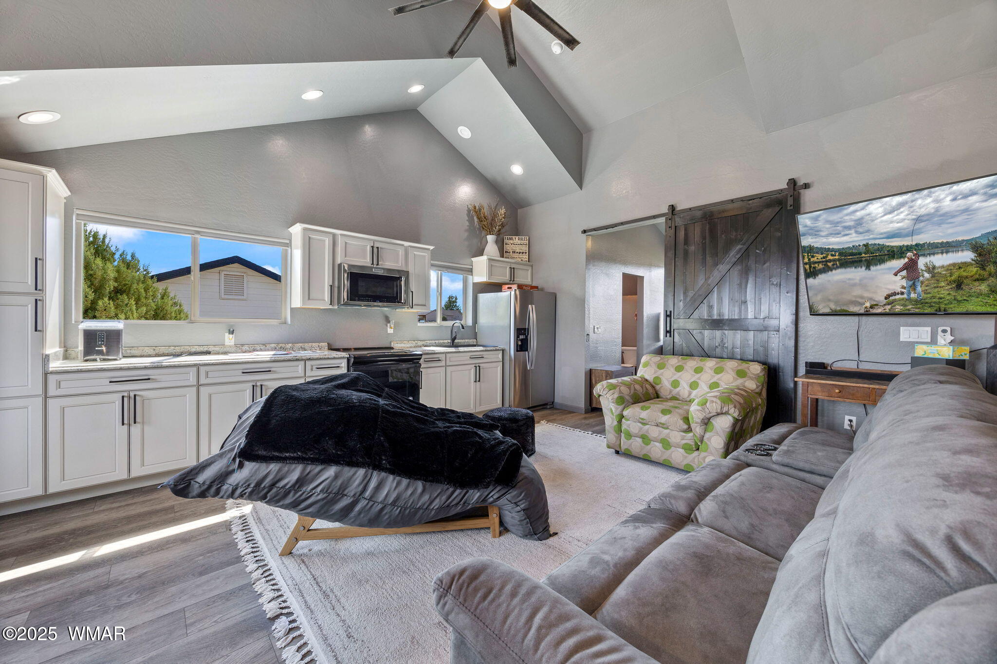 7106 Long Road Show Low, AZ 85901 - Photo 55 of 65 a living room with furniture and a large window