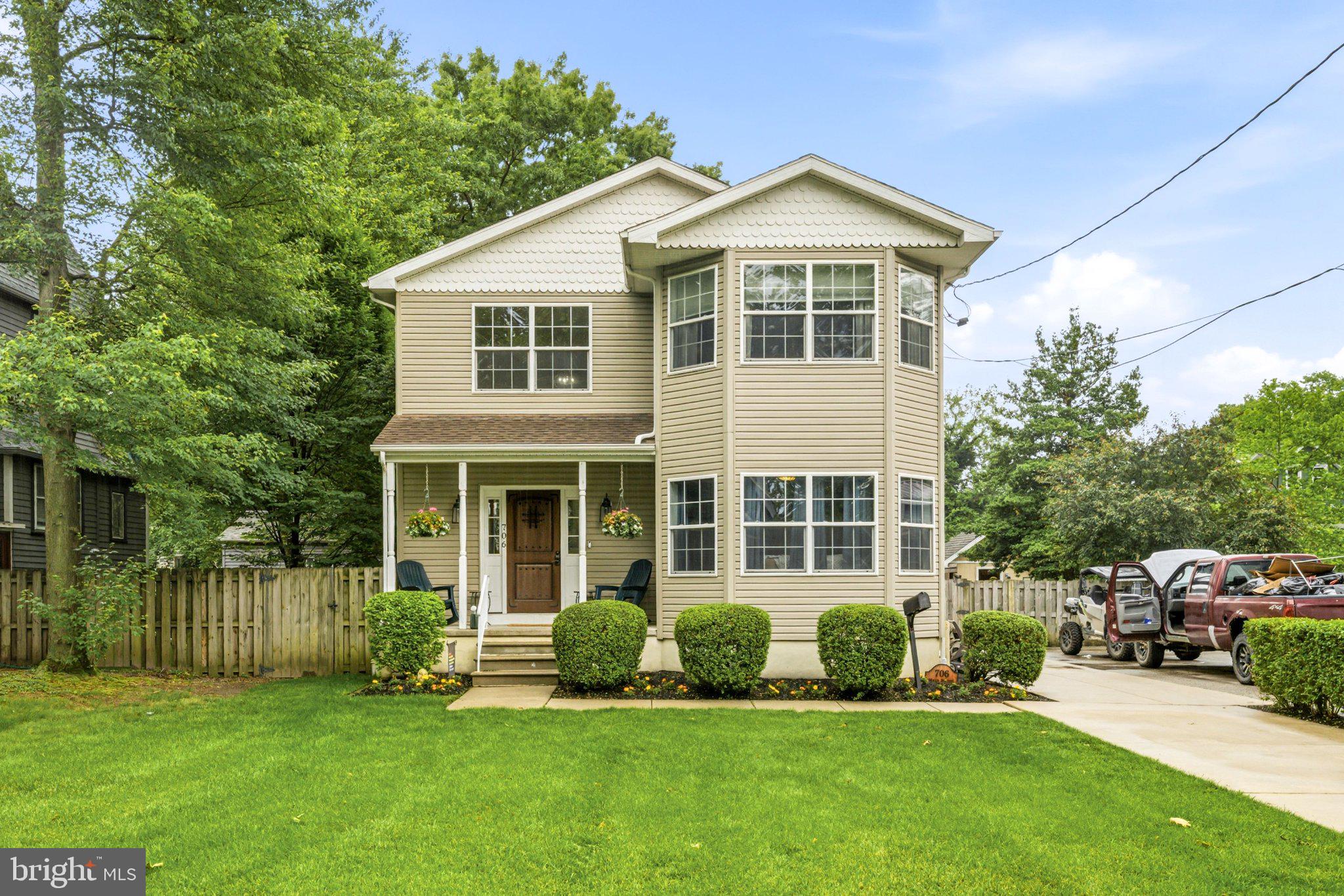 706 Main Street Riverton, NJ 08077 - Photo 1 of 44 Charming home with lush greenery.