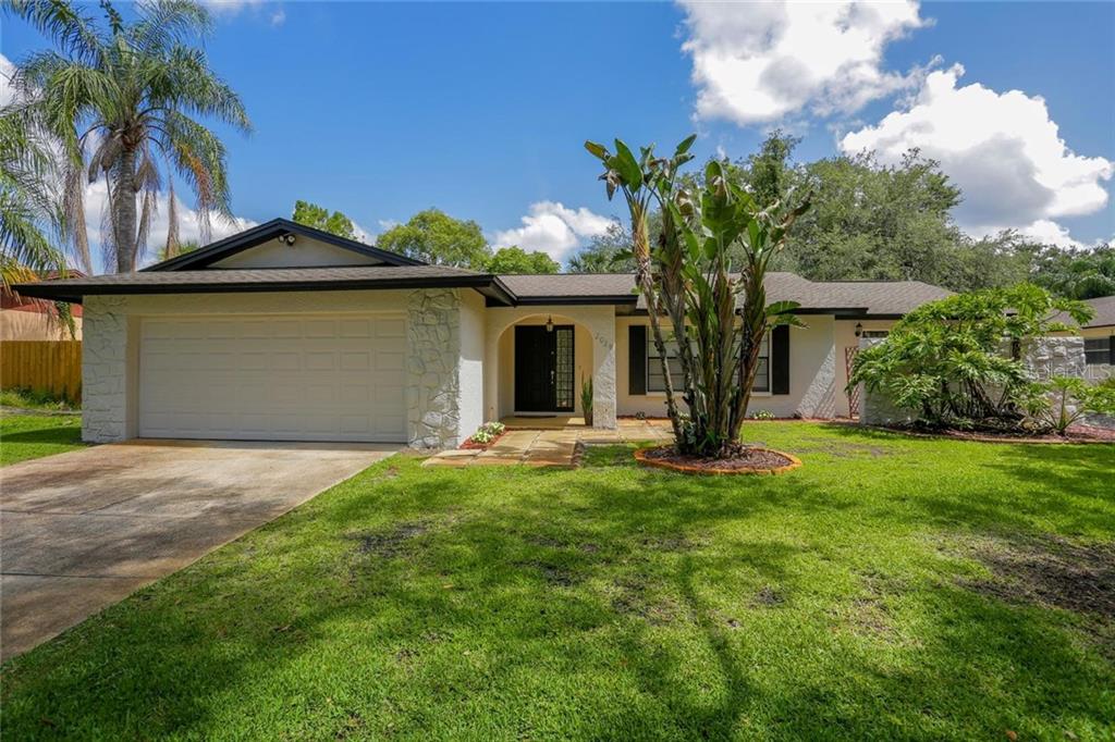 2029 Sussex Road Winter Park, FL 32792 - Photo 1 of 1 a front view of a house with garden