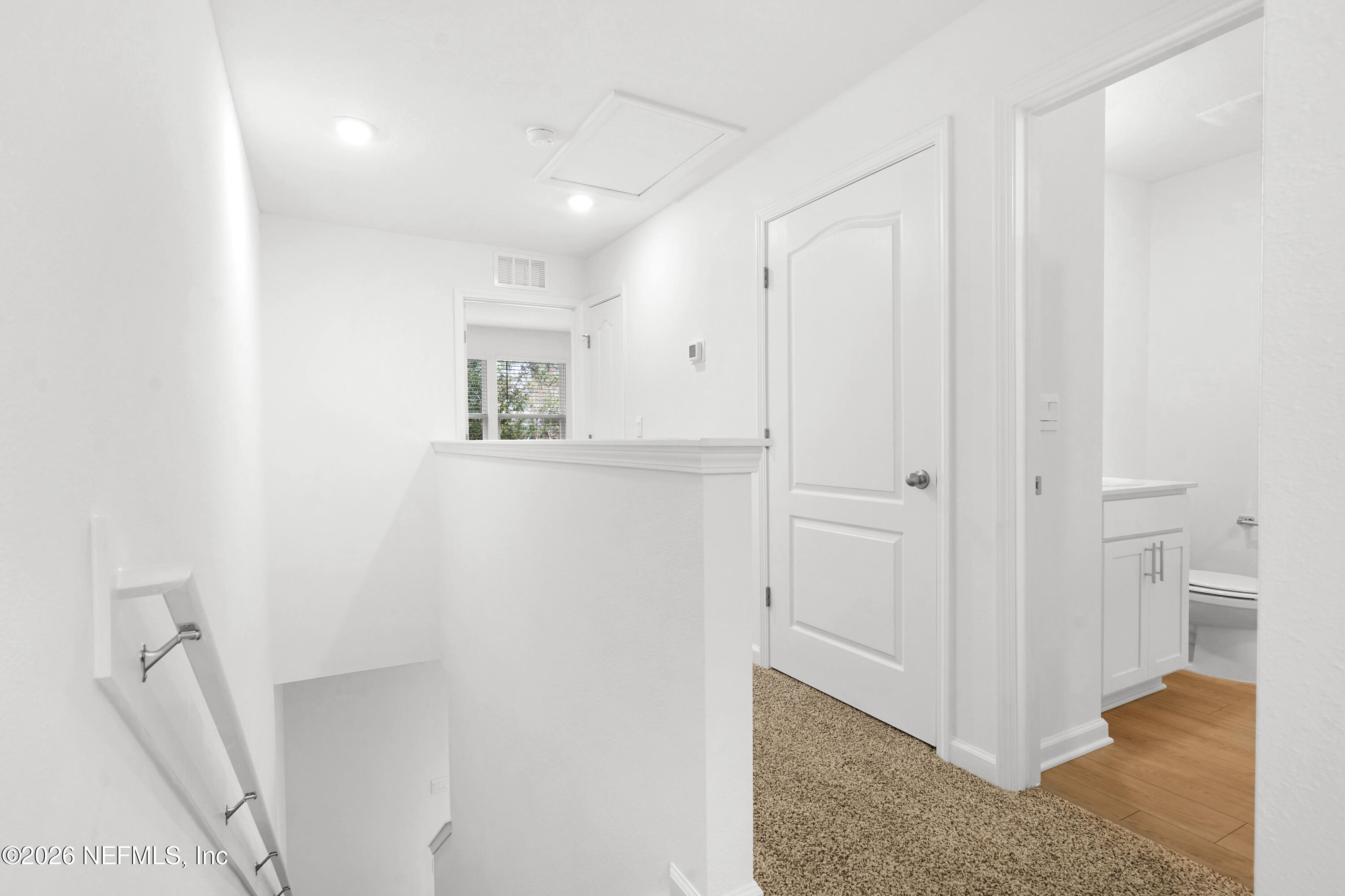 135 Palmetto Rdg Road St. Augustine, FL 32095 - Photo 14 of 27 a view of entryway with wooden floor