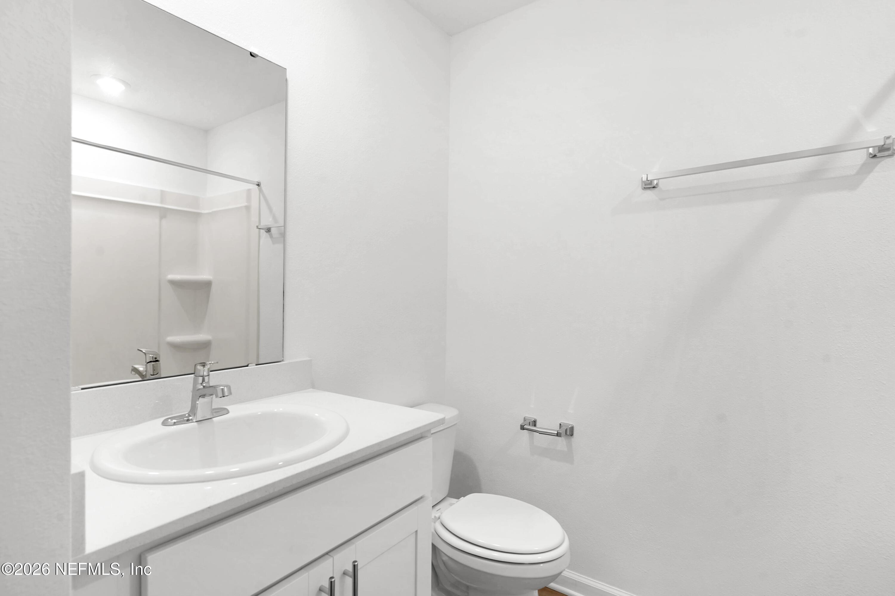135 Palmetto Rdg Road St. Augustine, FL 32095 - Photo 15 of 27 a bathroom with a sink a toilet and shower