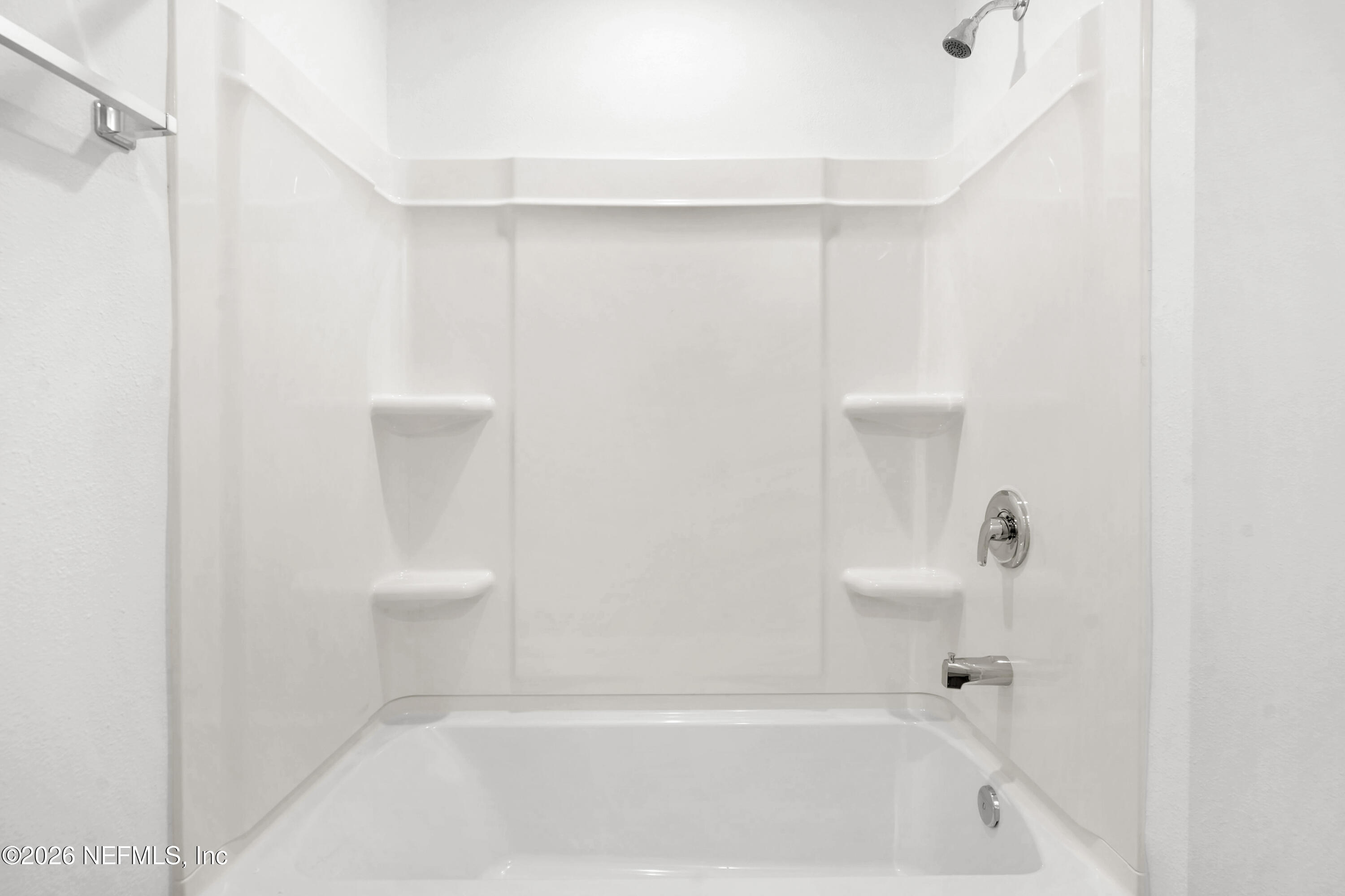 135 Palmetto Rdg Road St. Augustine, FL 32095 - Photo 16 of 27 a bathroom with a bathtub and a toilet