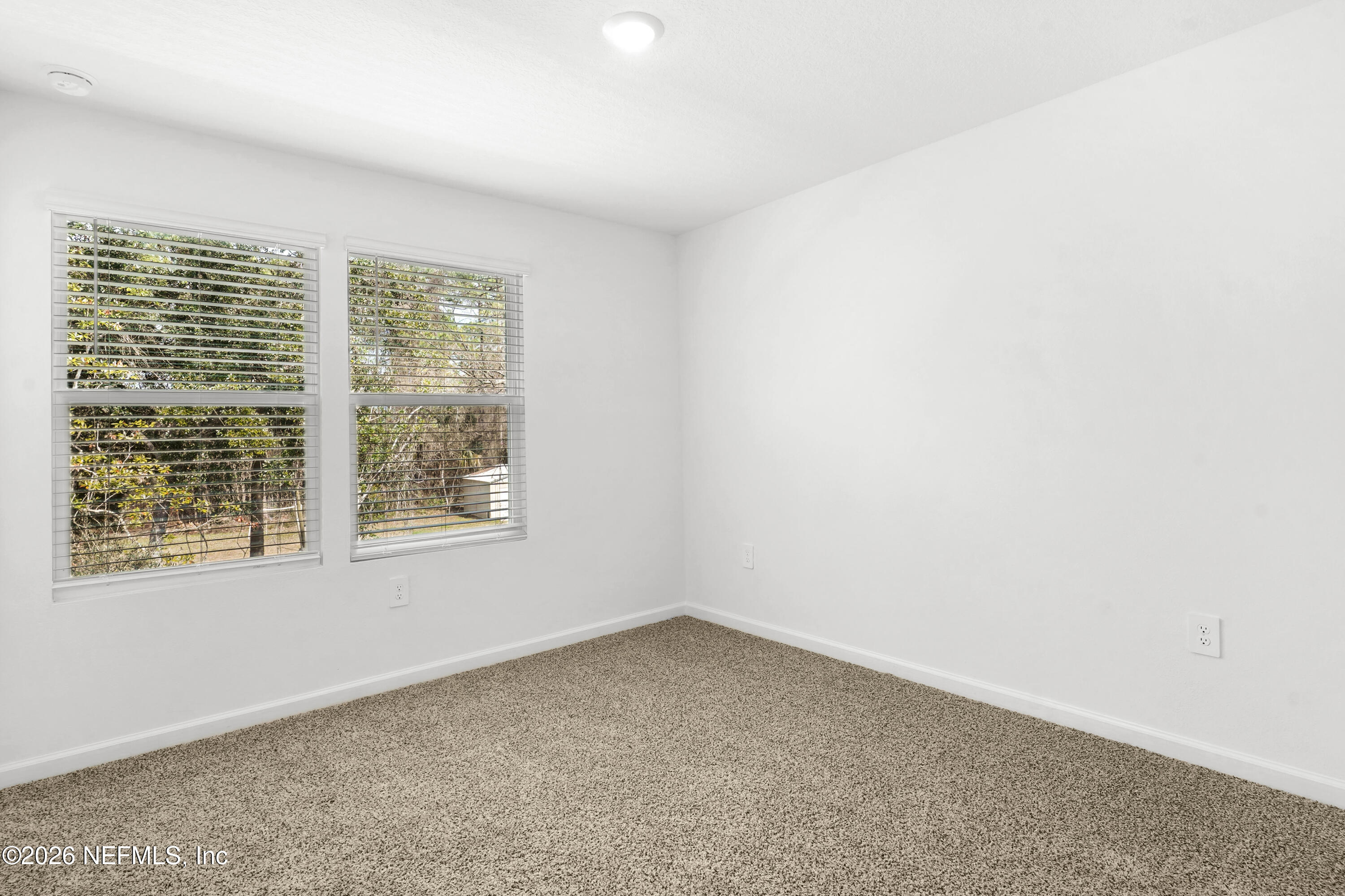 135 Palmetto Rdg Road St. Augustine, FL 32095 - Photo 17 of 27 an empty room with a window