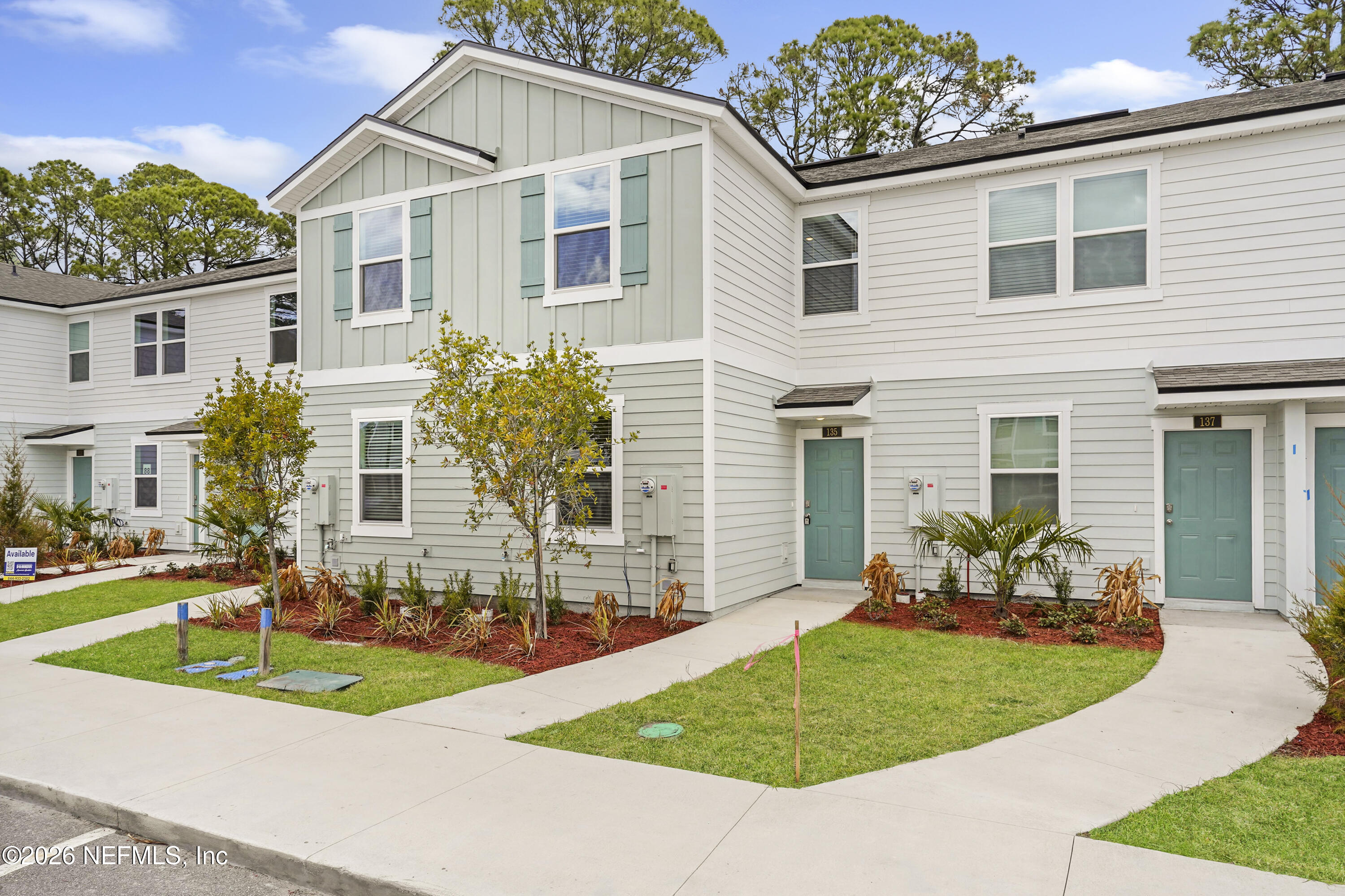 135 Palmetto Rdg Road St. Augustine, FL 32095 - Photo 2 of 27 a front view of a house with a yard