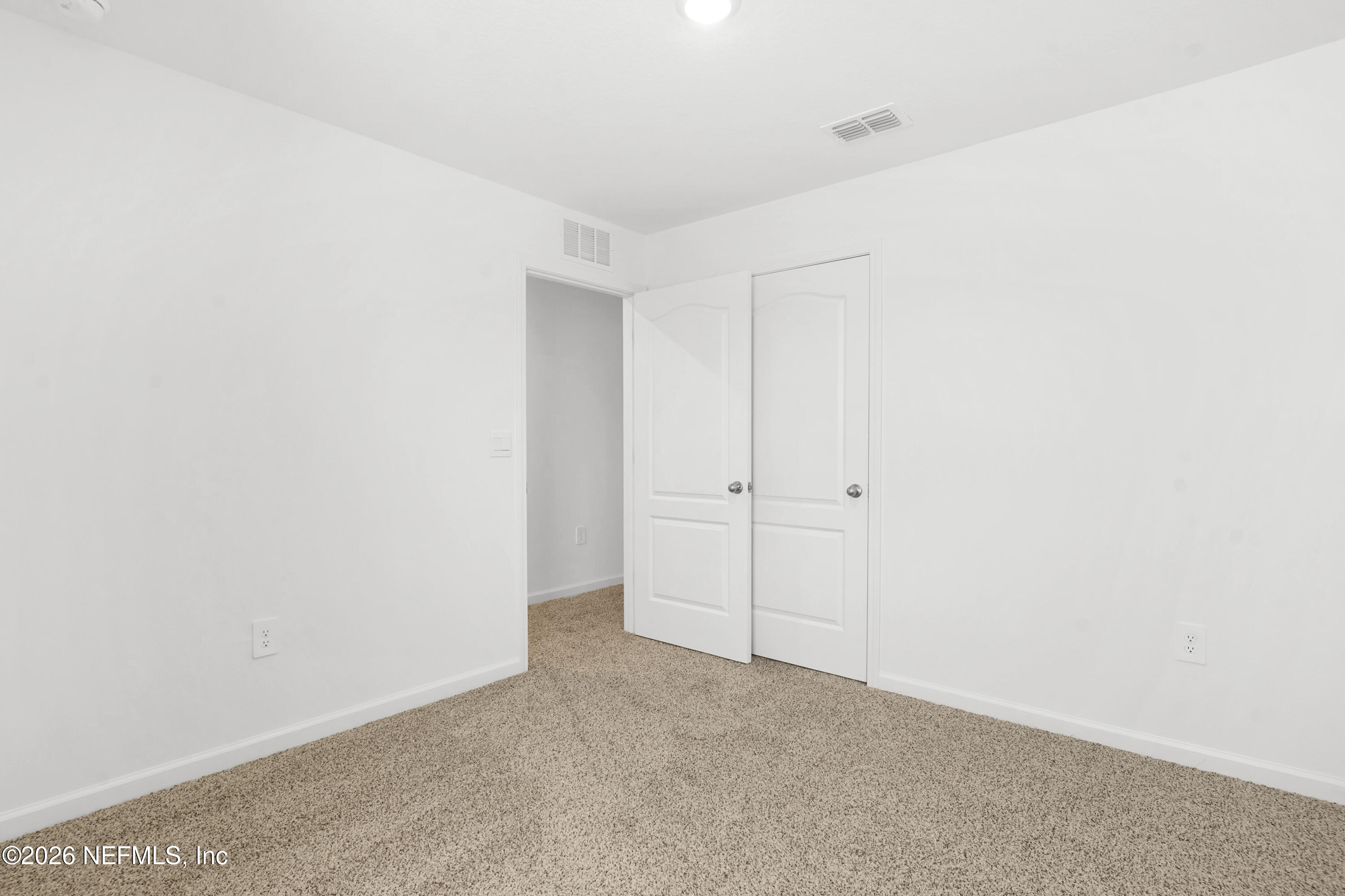 135 Palmetto Rdg Road St. Augustine, FL 32095 - Photo 23 of 27 a view of an empty room