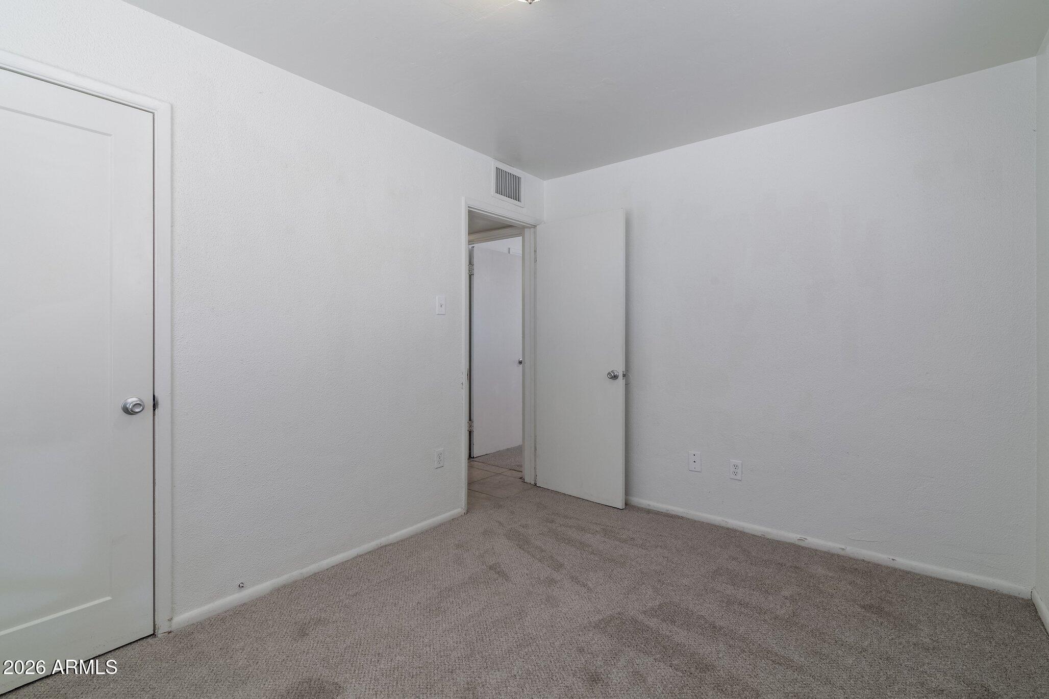 1335 East Broadway Road Mesa, AZ 85204 - Photo 19 of 23 a view of hallway with closet