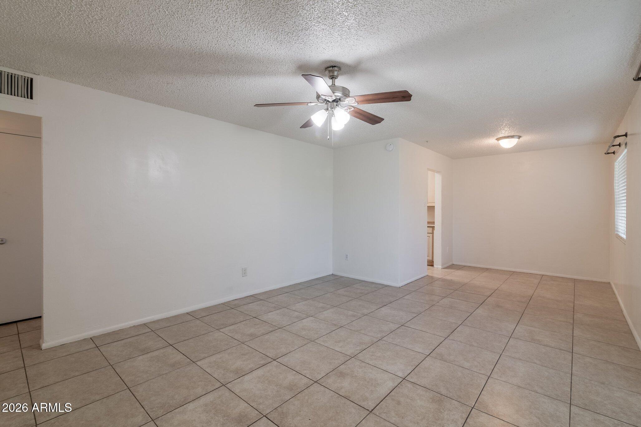 1335 East Broadway Road Mesa, AZ 85204 - Photo 10 of 23 a view of an empty room