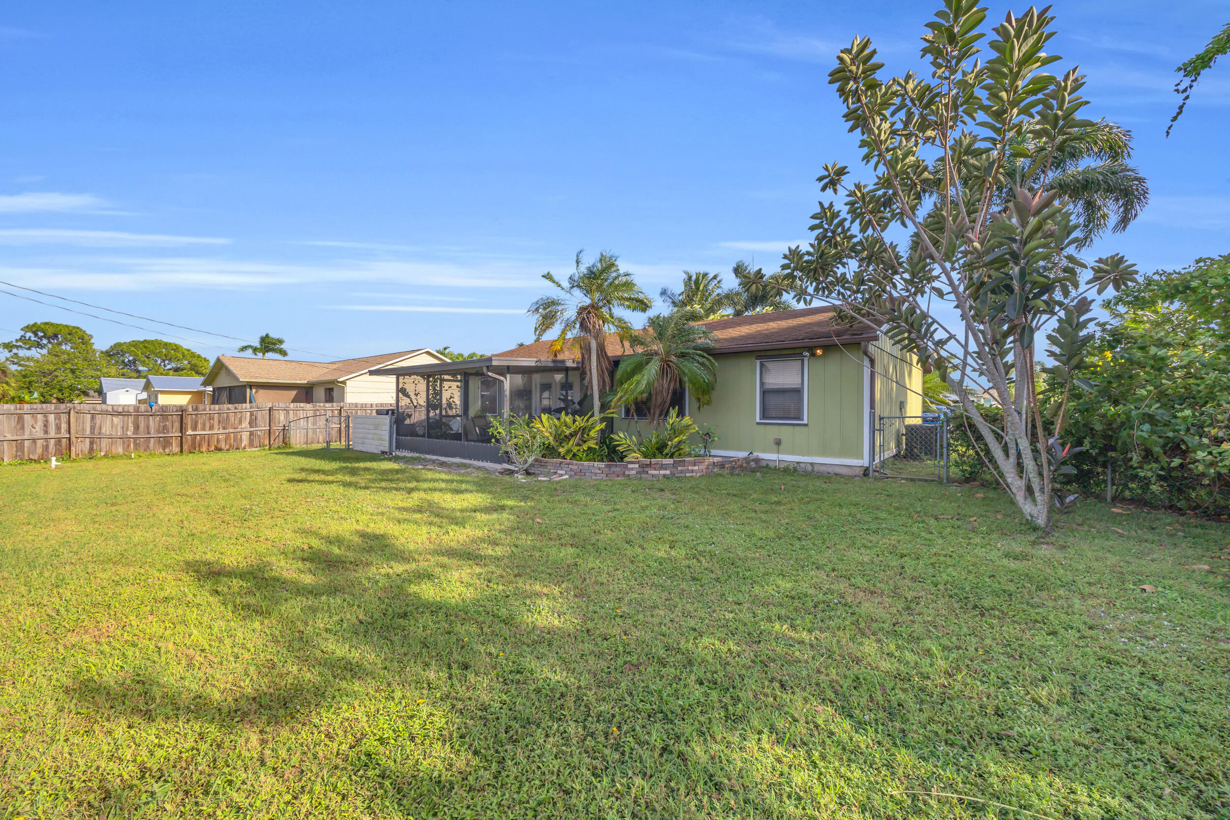 261 Southwest Chelsea Terrace Port St. Lucie, FL 34984 - Photo 25 of 25 a front view of house with yard and seating area