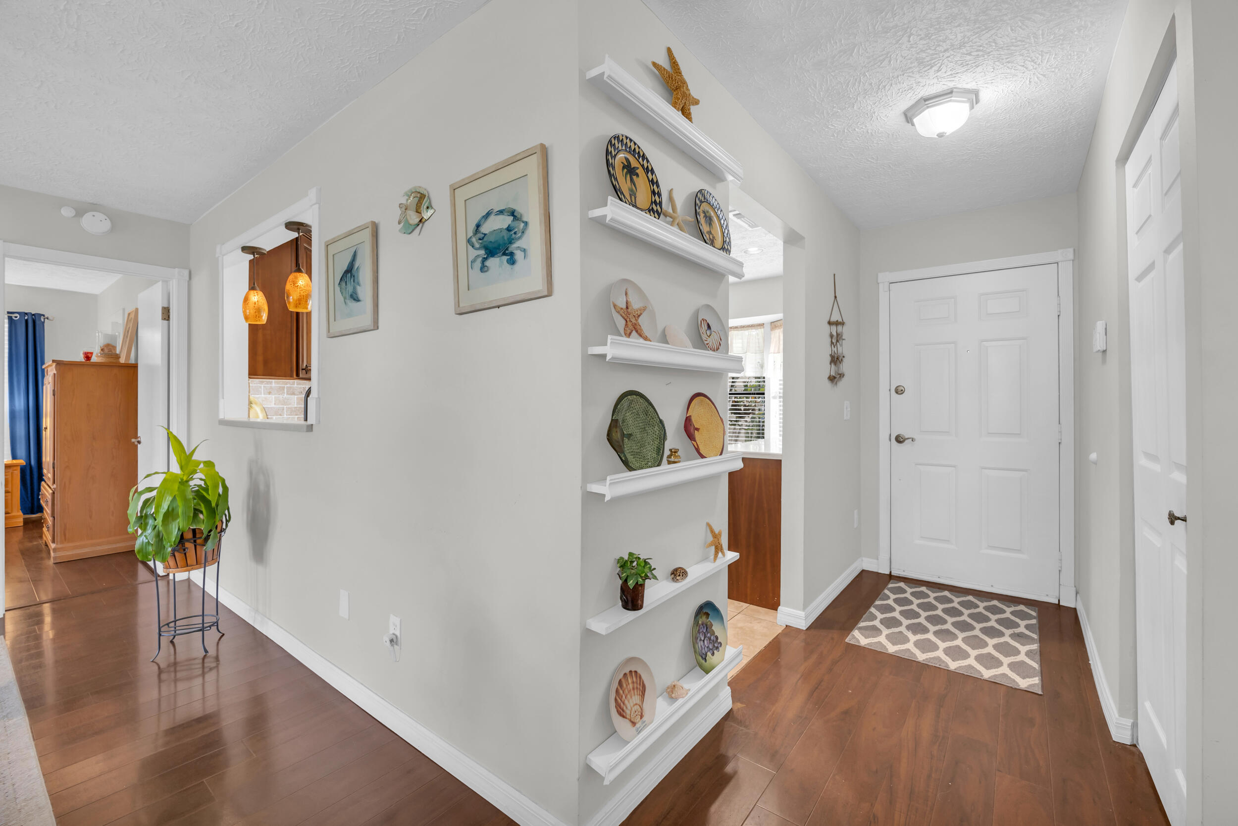 261 Southwest Chelsea Terrace Port St. Lucie, FL 34984 - Photo 3 of 25 a bedroom with furniture and a window