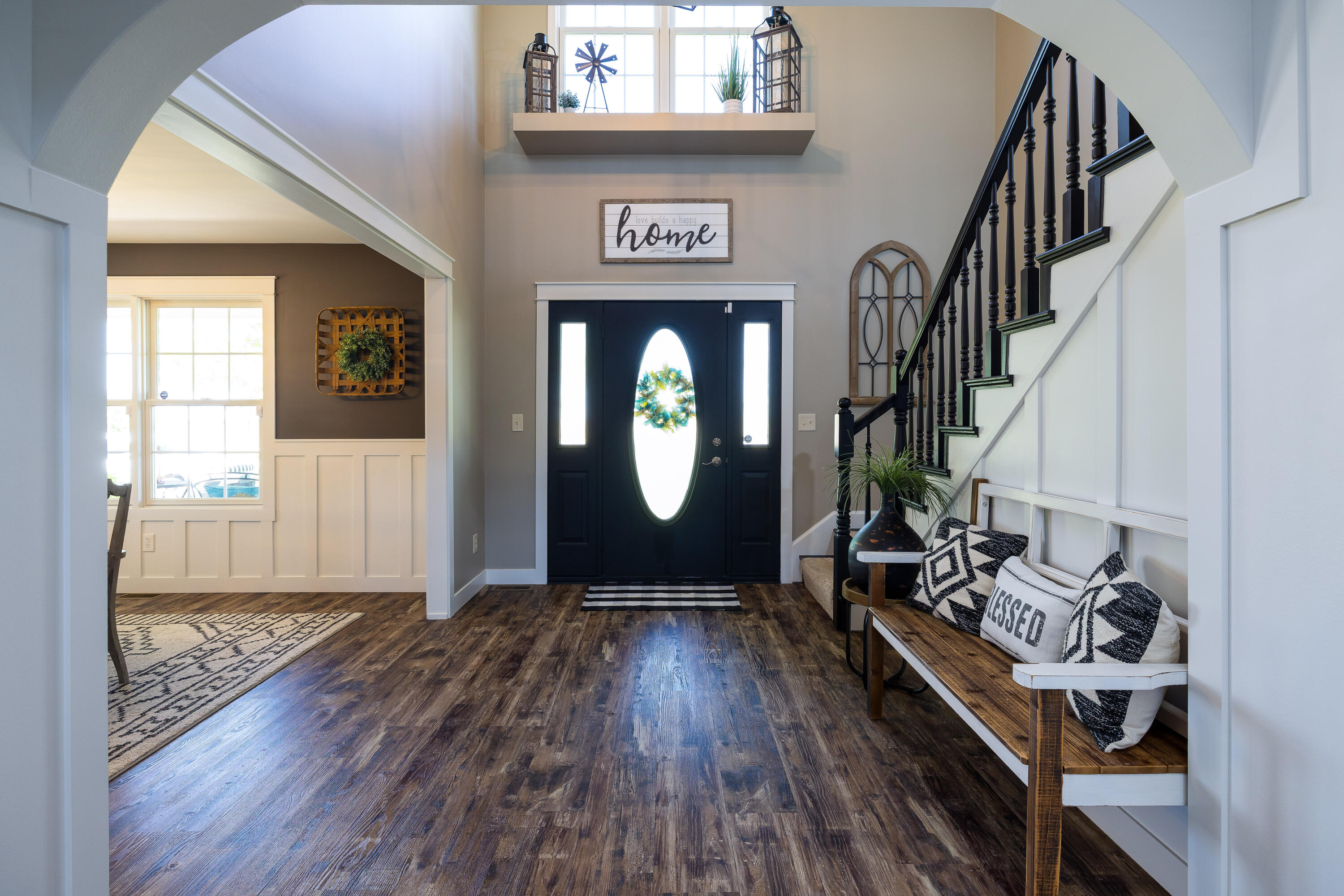 1601 East Amsler Road Rensselaer, IN 47978 - Photo 12 of 70 a view of a livingroom with wooden floor and stairs