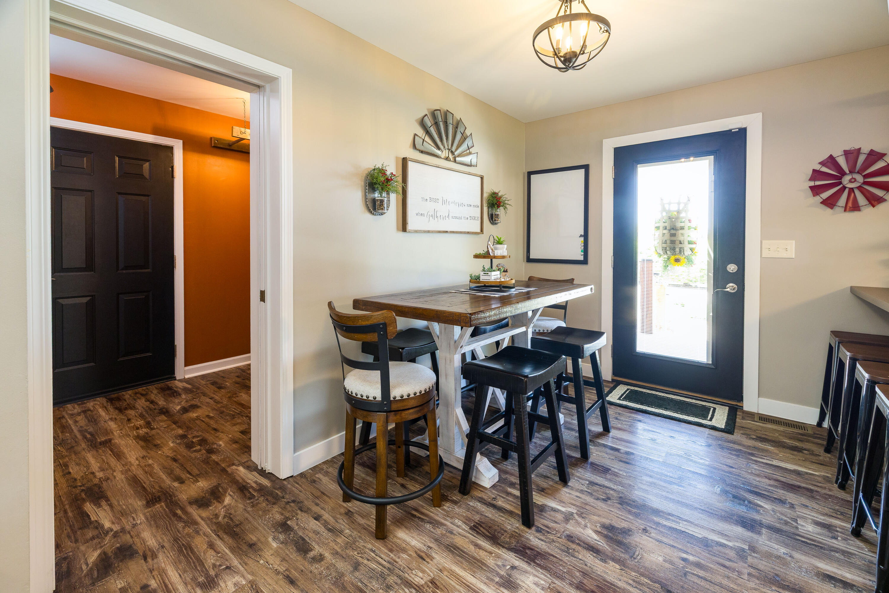 1601 East Amsler Road Rensselaer, IN 47978 - Photo 24 of 70 a view of a dining room with furniture and wooden floor