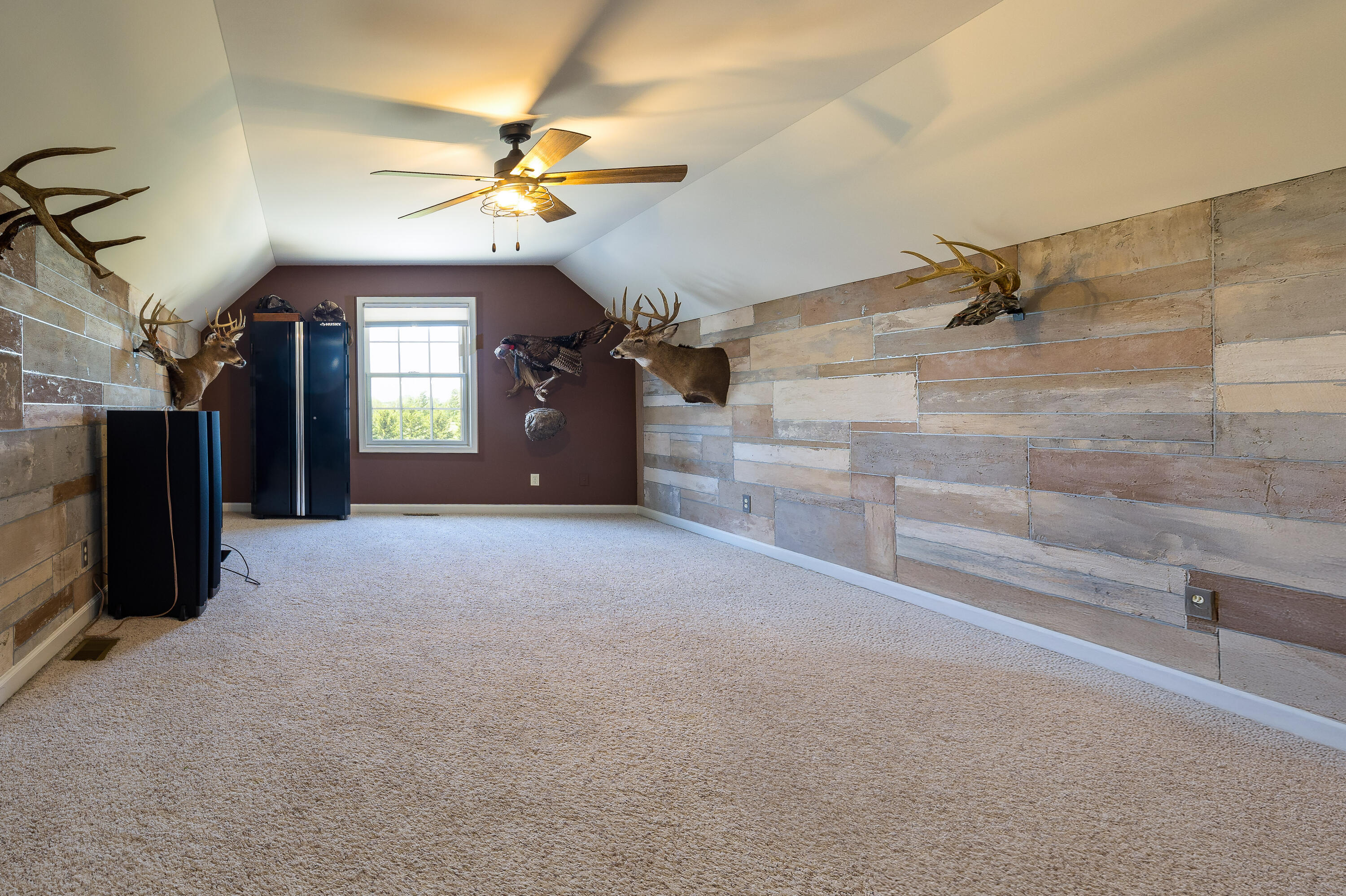 1601 East Amsler Road Rensselaer, IN 47978 - Photo 33 of 70 a view of a livingroom with a ceiling fan and window