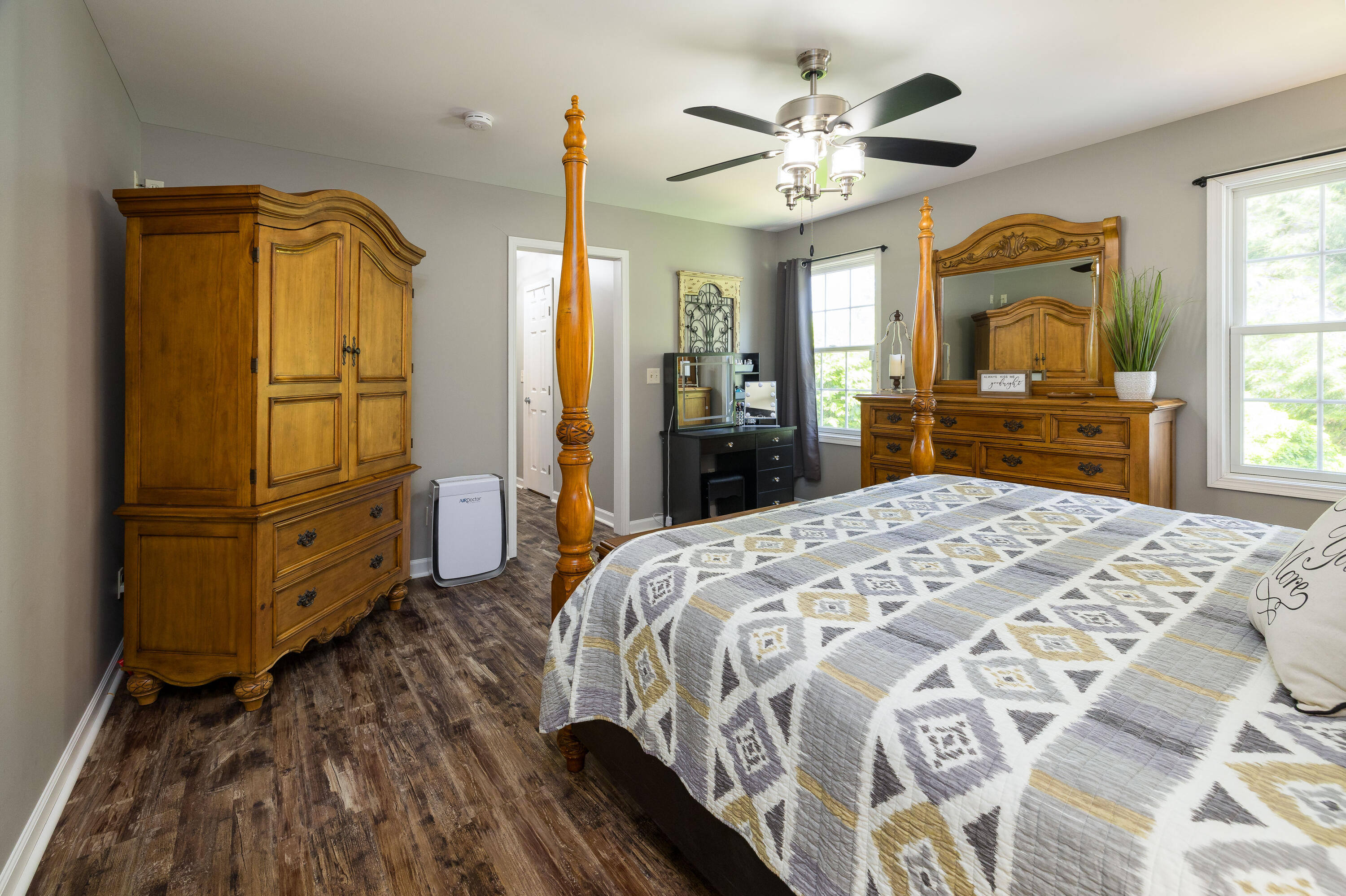 1601 East Amsler Road Rensselaer, IN 47978 - Photo 39 of 70 a bedroom with a bed dresser and a mirror