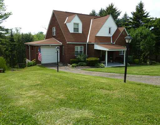 24 Tidball Road Pittsburgh, PA 15205 - Photo 1 of 18 Exterior Front. Solid brick home situated on a mature wooded lot.