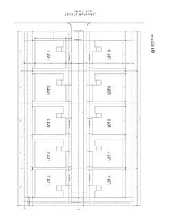 a view of a field with trees in background
