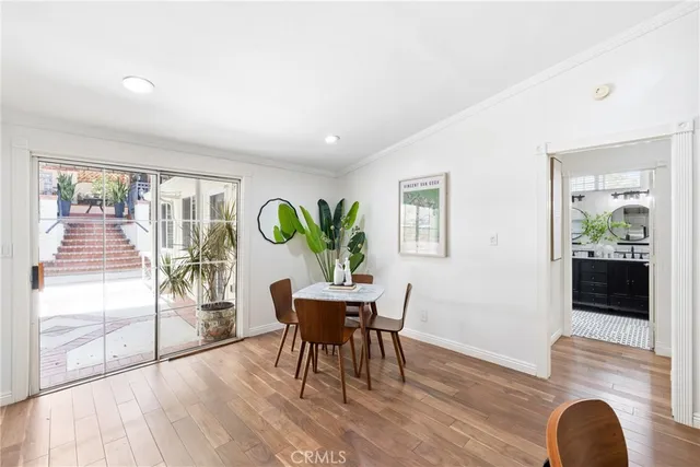 a bedroom with bed and window